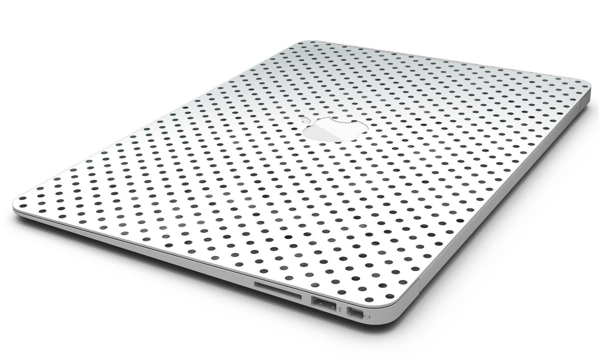 Black and gray fade polka dots skin kit for MacBook Air, showcasing a stylish design that protects the device from scratches.