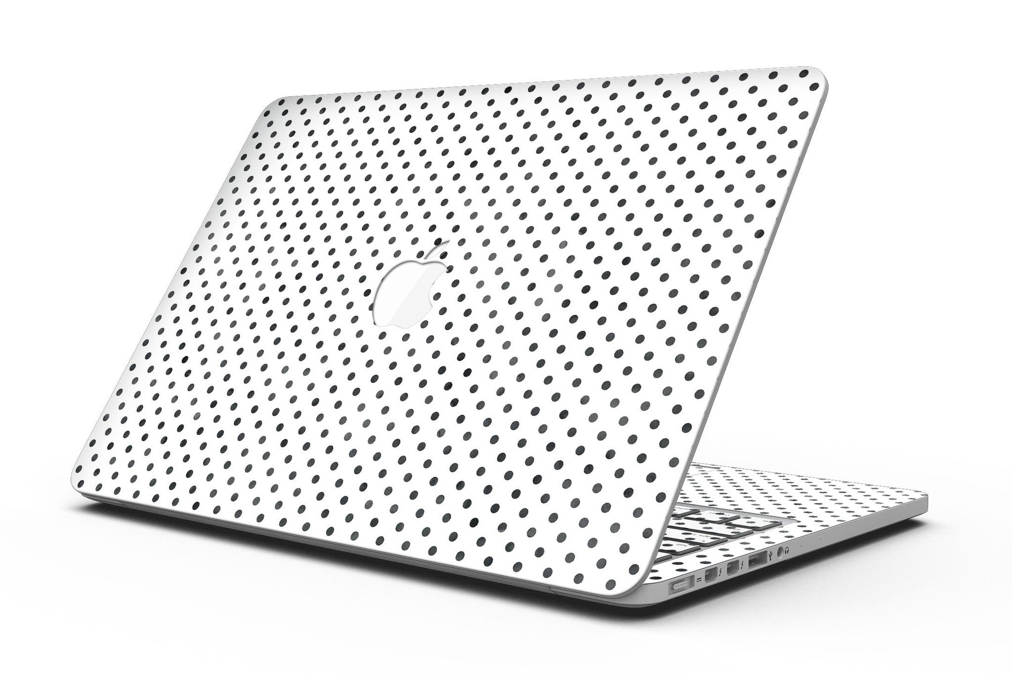 Black and gray fade polka dots skin for MacBook Pro with Retina Display, showcasing a stylish design that protects the device.