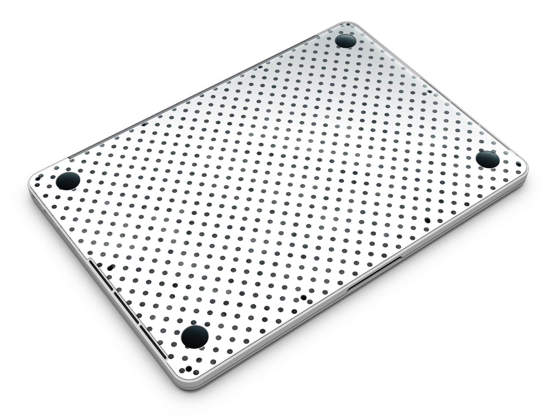 Black and gray fade polka dots skin for MacBook Pro with Retina Display, showcasing a stylish design that protects the device.