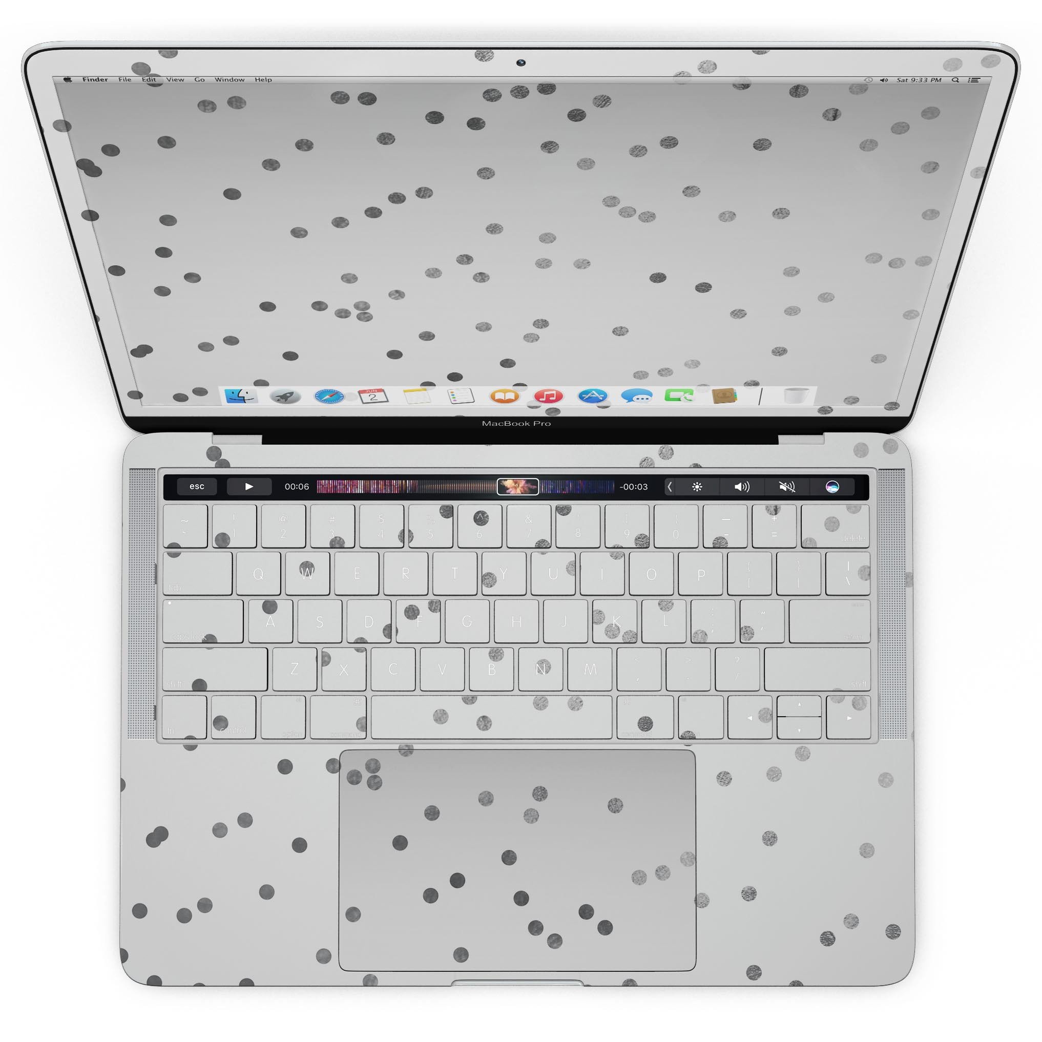 Black and gray scattered polka dots skin for MacBook Pro with Touch Bar, showcasing a stylish design that protects the device.