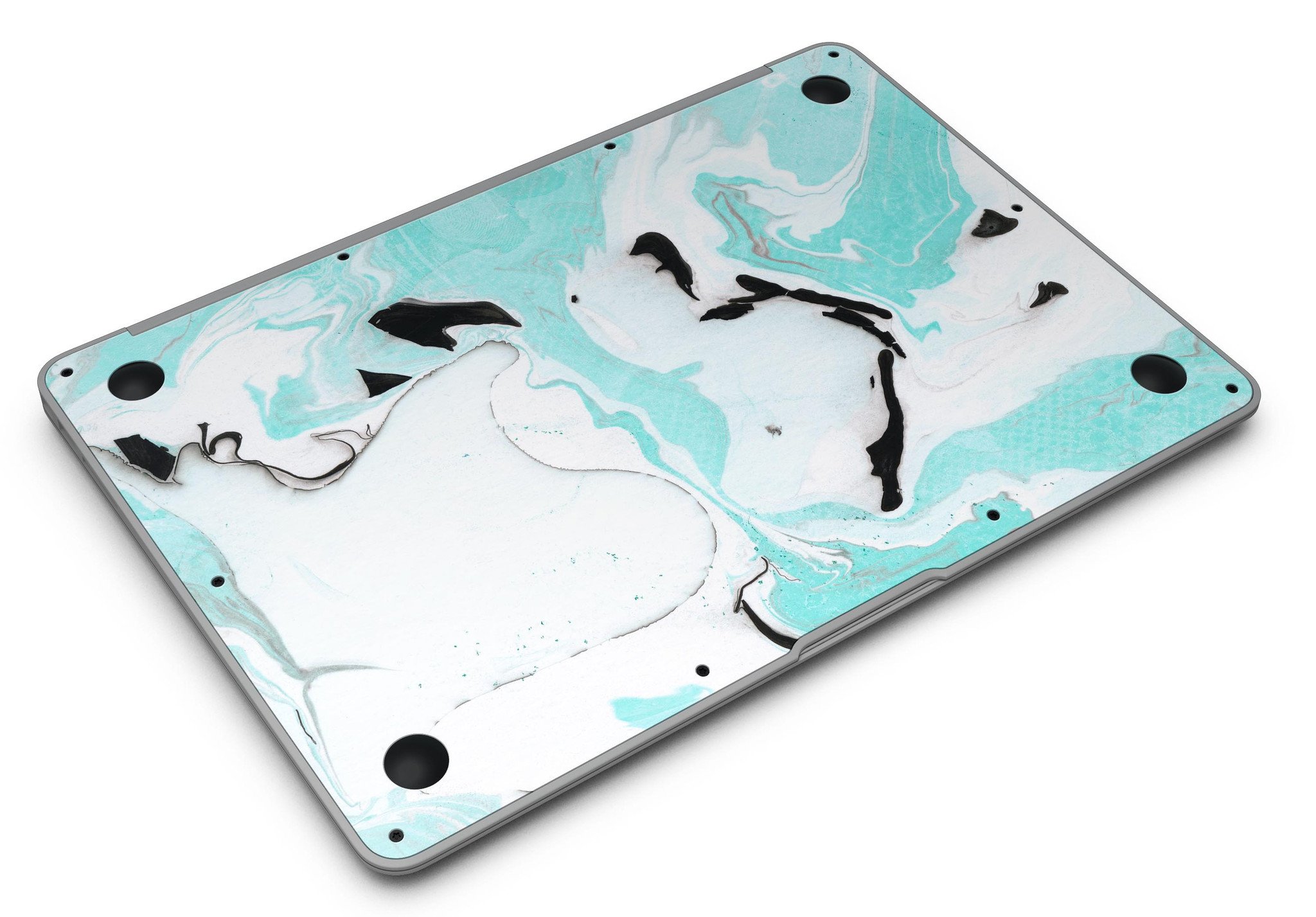 Black and teal textured marble skin applied to a MacBook Air, showcasing its stylish design and premium finish.