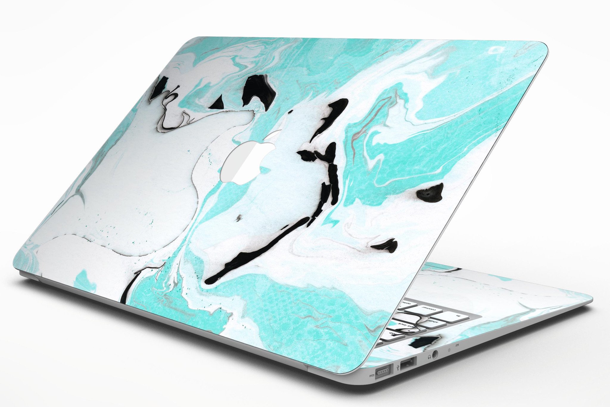 Black and teal textured marble skin applied to a MacBook Air, showcasing its stylish design and premium finish.