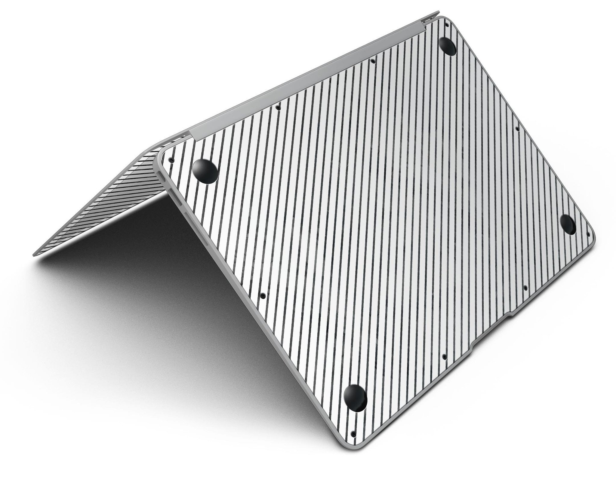 Black and white diagonal stripes skin kit for MacBook Air, showcasing a stylish design that protects the device from scratches.