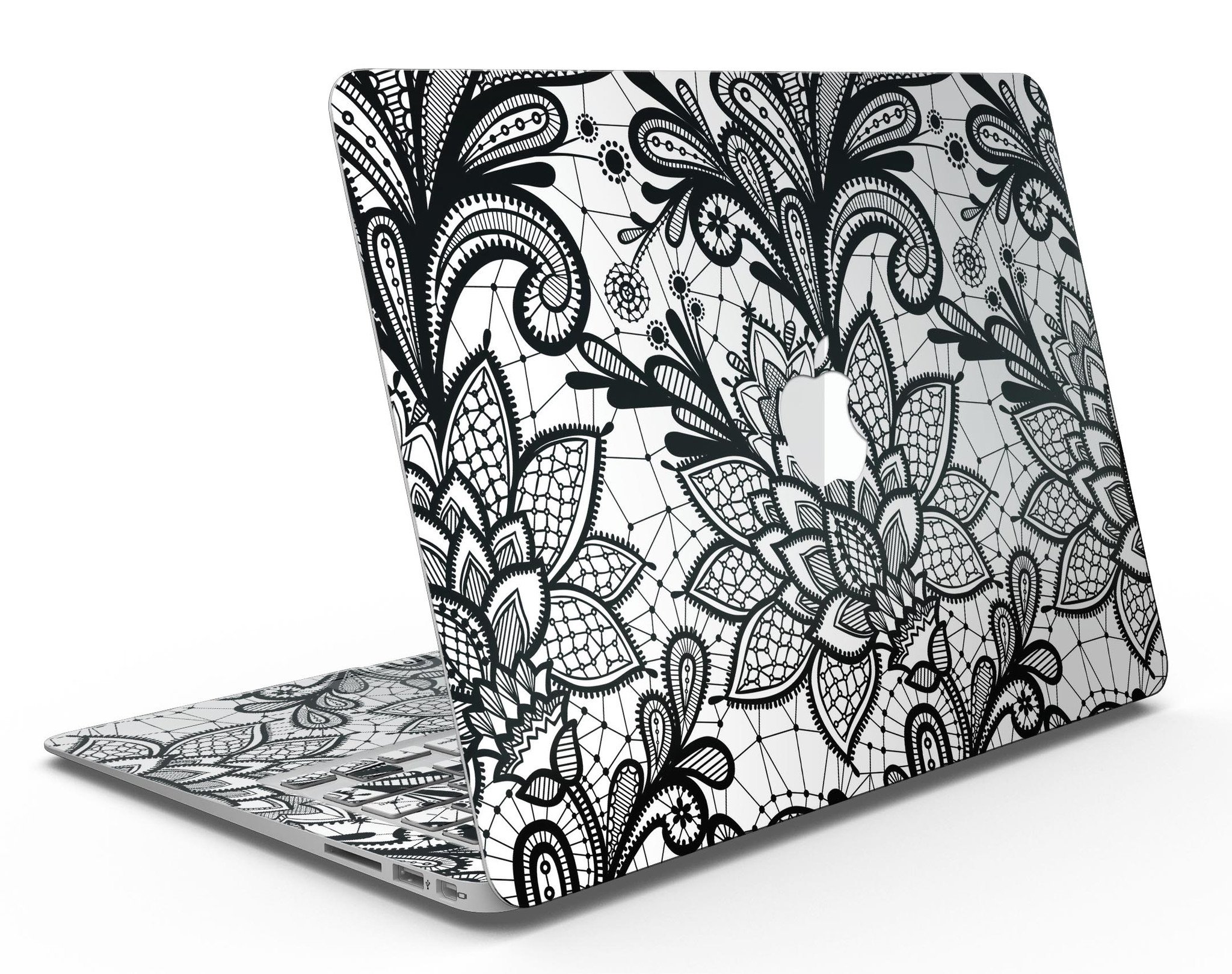 Black and white geometric floral skin for MacBook Air, showcasing a stylish design that protects the device.