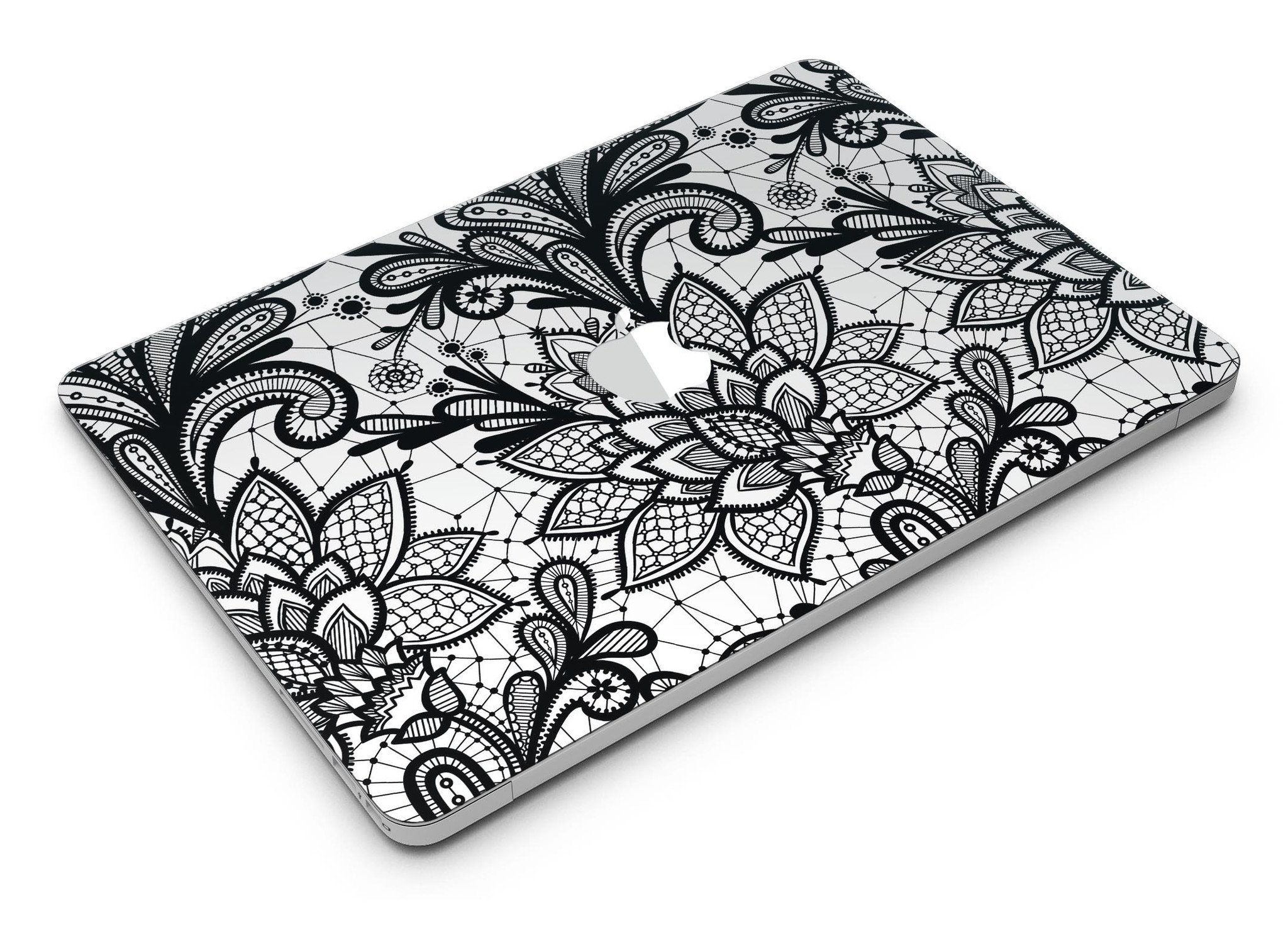 Black and white geometric floral skin for MacBook Air, showcasing a stylish design that protects the device.