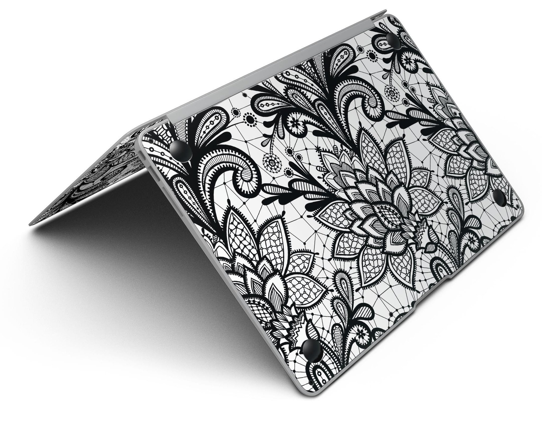 Black and white geometric floral skin for MacBook Air, showcasing a stylish design that protects the device.