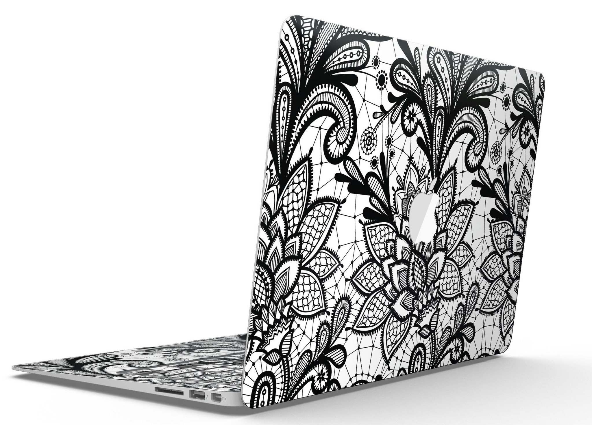 Black and white geometric floral skin for MacBook Air, showcasing a stylish design that protects the device.