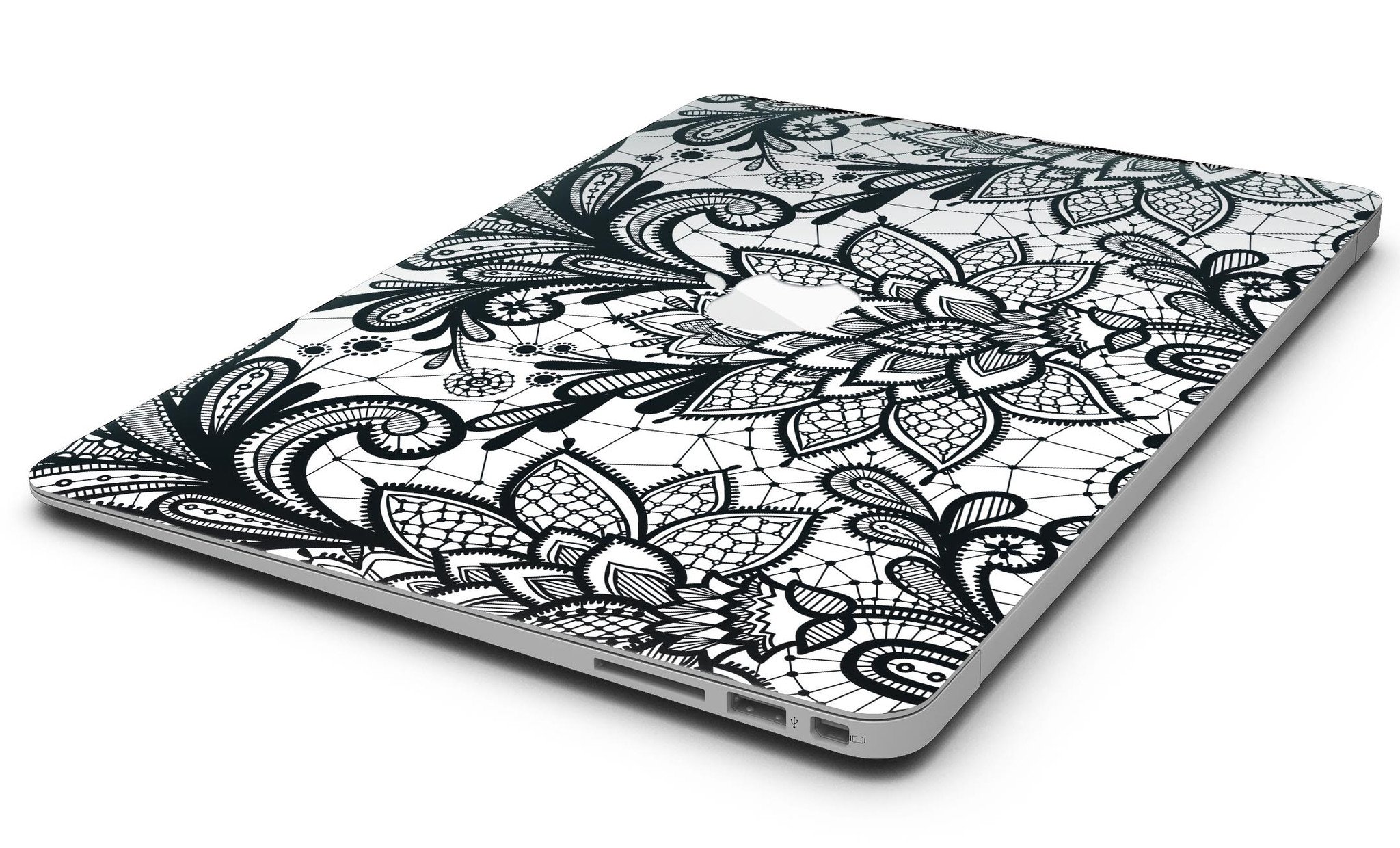 Black and white geometric floral skin for MacBook Air, showcasing a stylish design that protects the device.