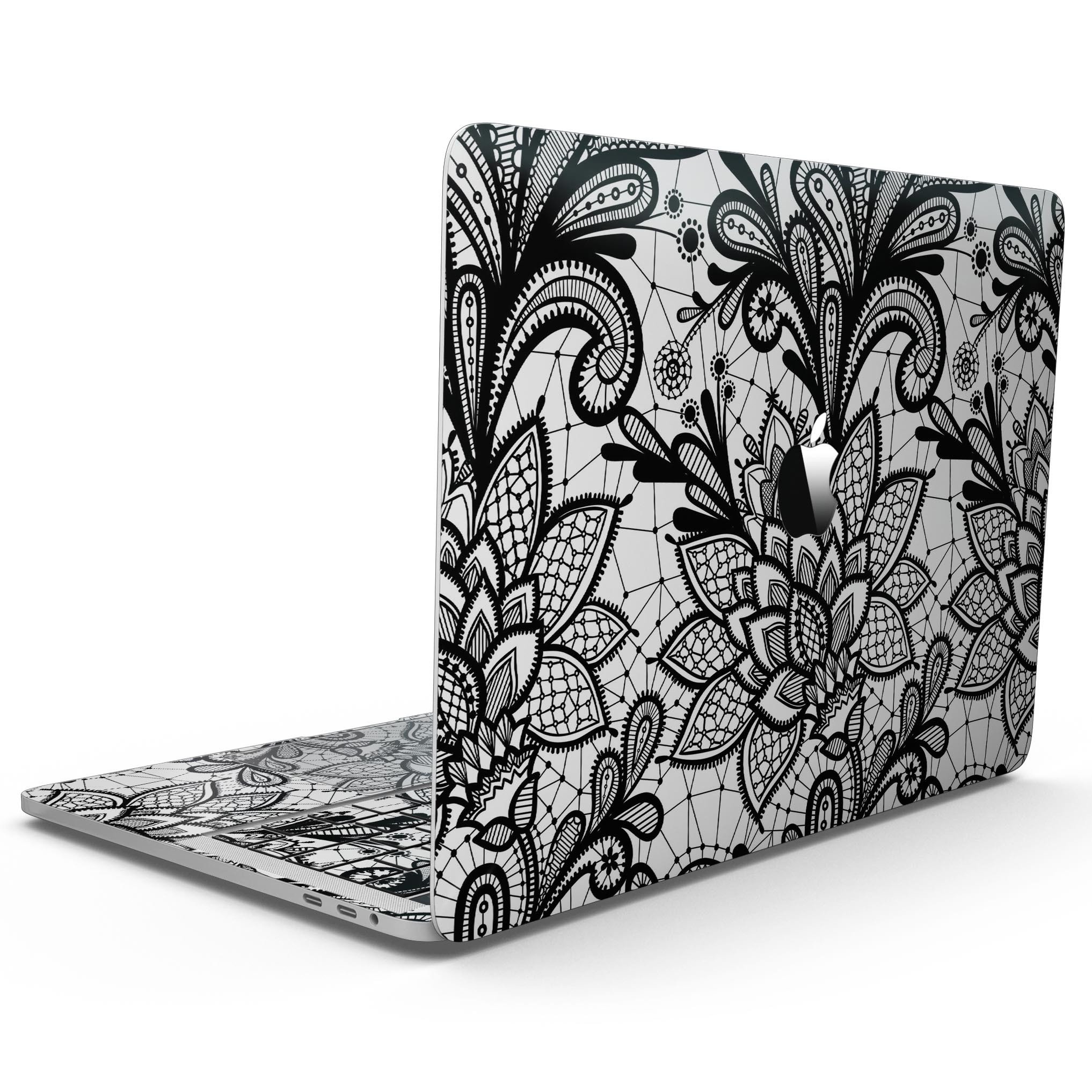 Black and White Geometric Floral skin kit for MacBook Pro with Touch Bar, showcasing a stylish design that fits perfectly on the device.