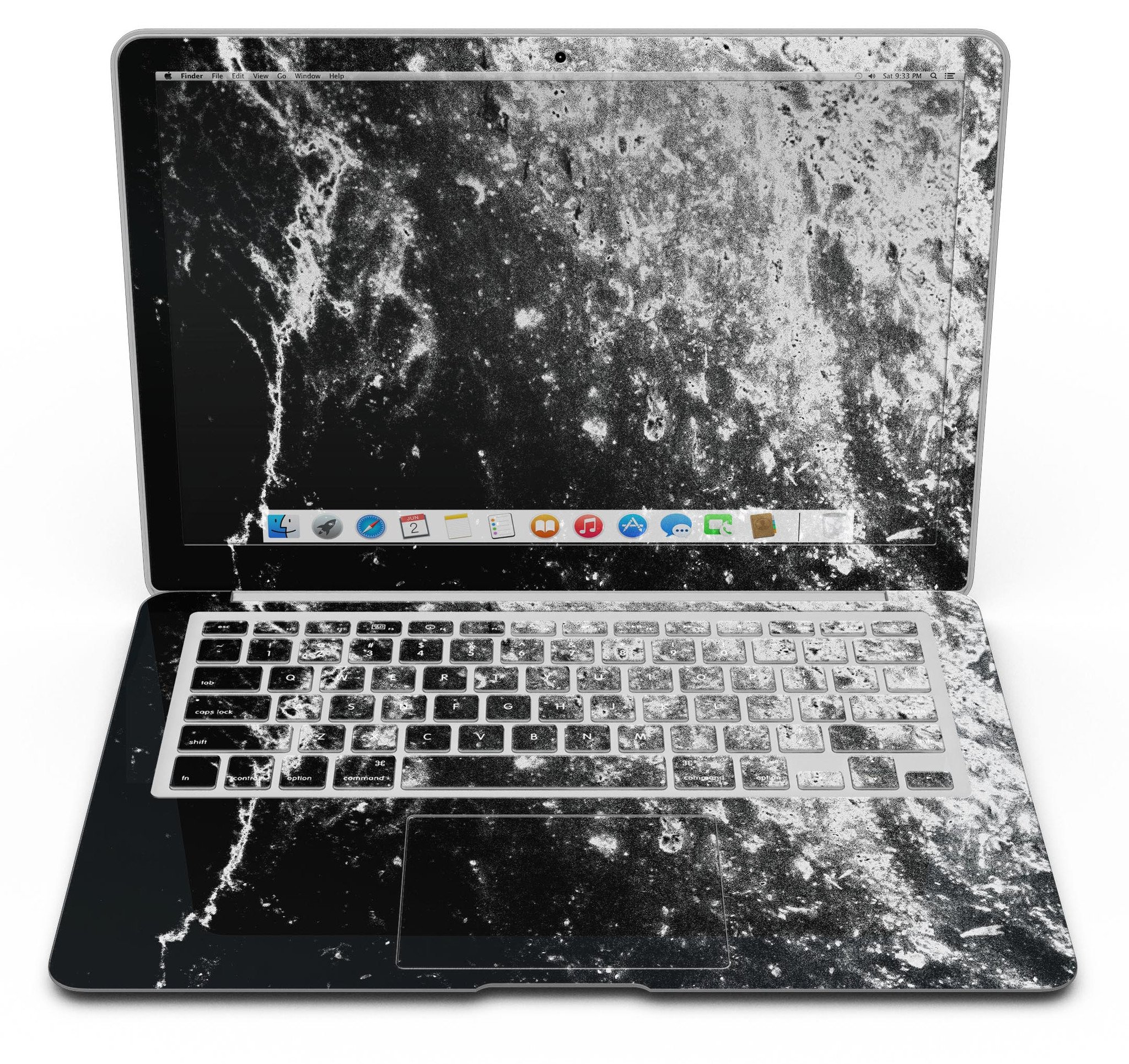 Black and white grungy marble skin applied to a MacBook Air, showcasing its stylish design and sleek finish.