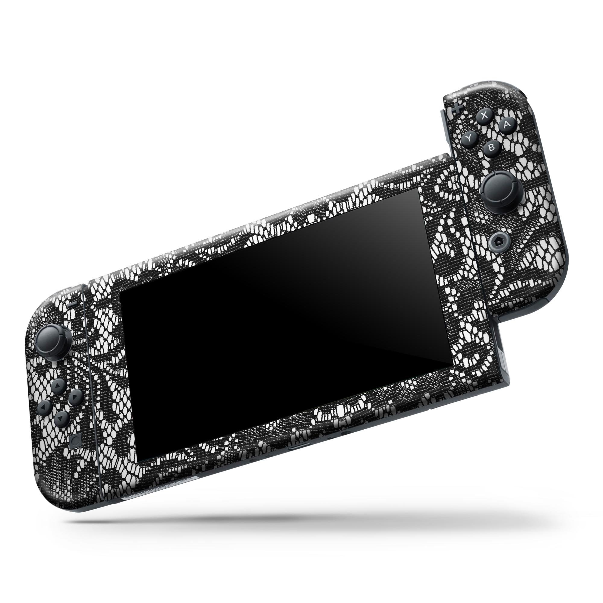 Black and white lace pattern skin wrap kit for Nintendo Switch, showcasing the design and fit on the console and controllers.