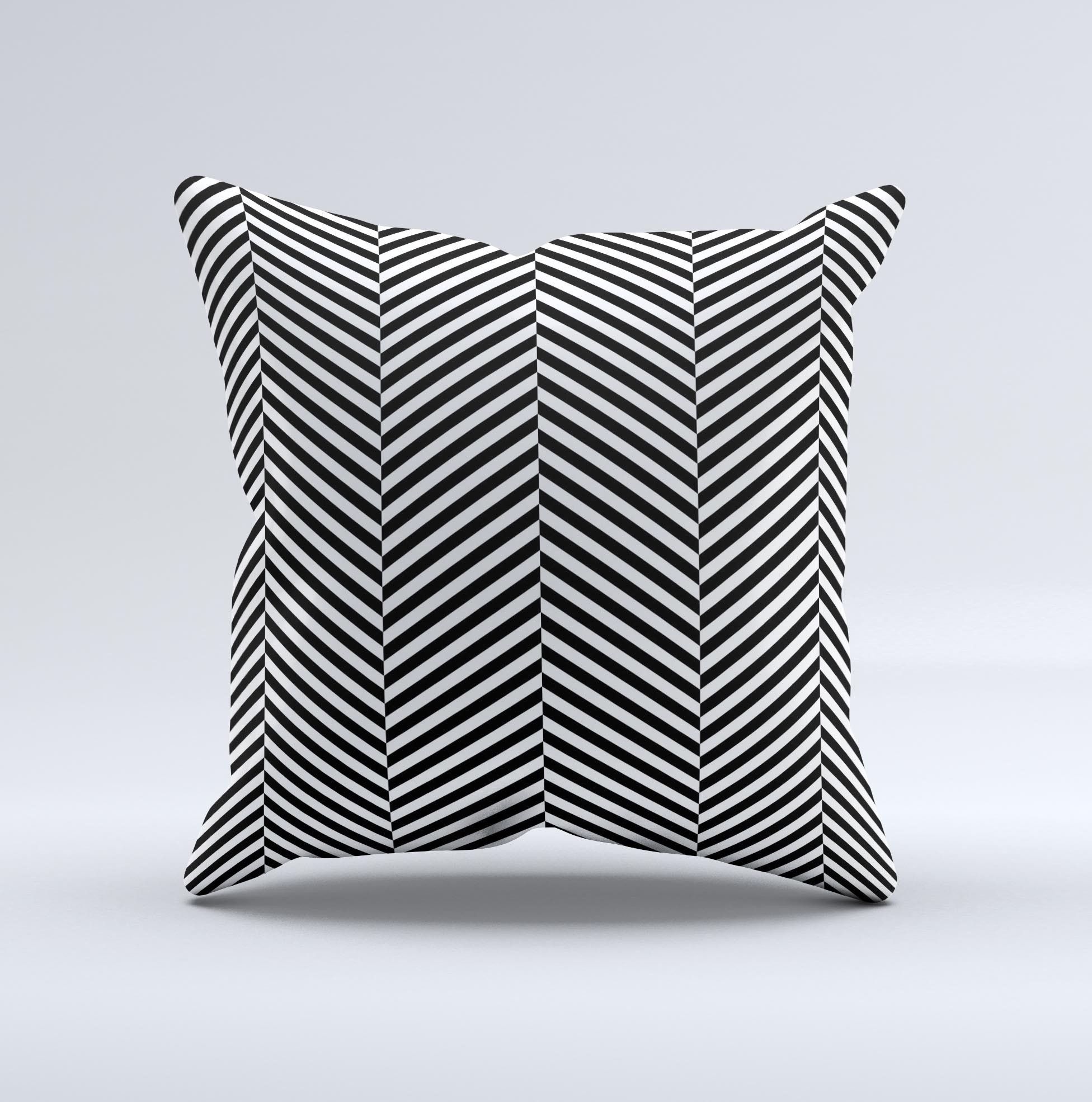 Black and white decorative throw pillow with opposite stripes, handcrafted in Virginia, showcasing unique artisanal design.