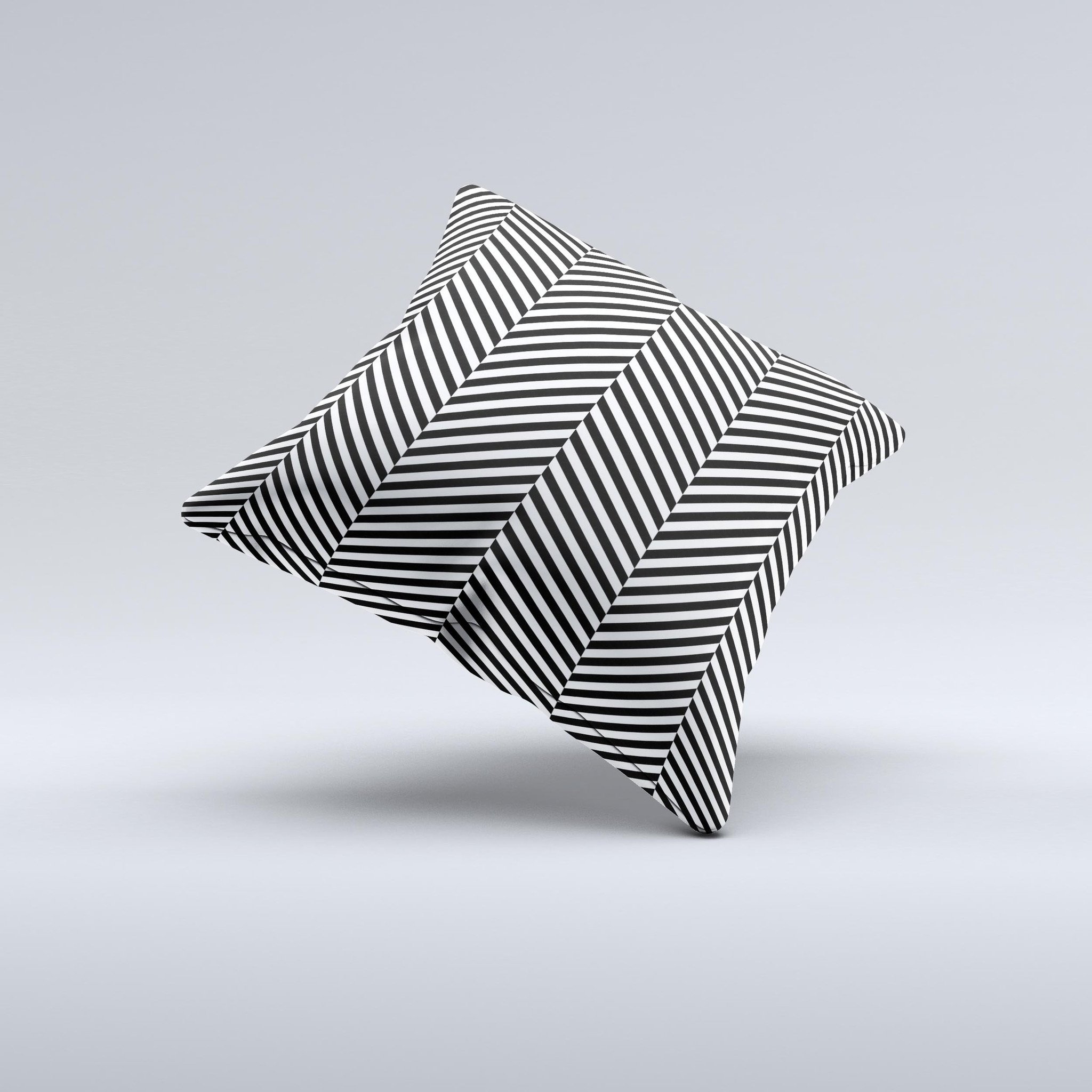 Black and white decorative throw pillow with opposite stripes, handcrafted in Virginia, showcasing unique artisanal design.