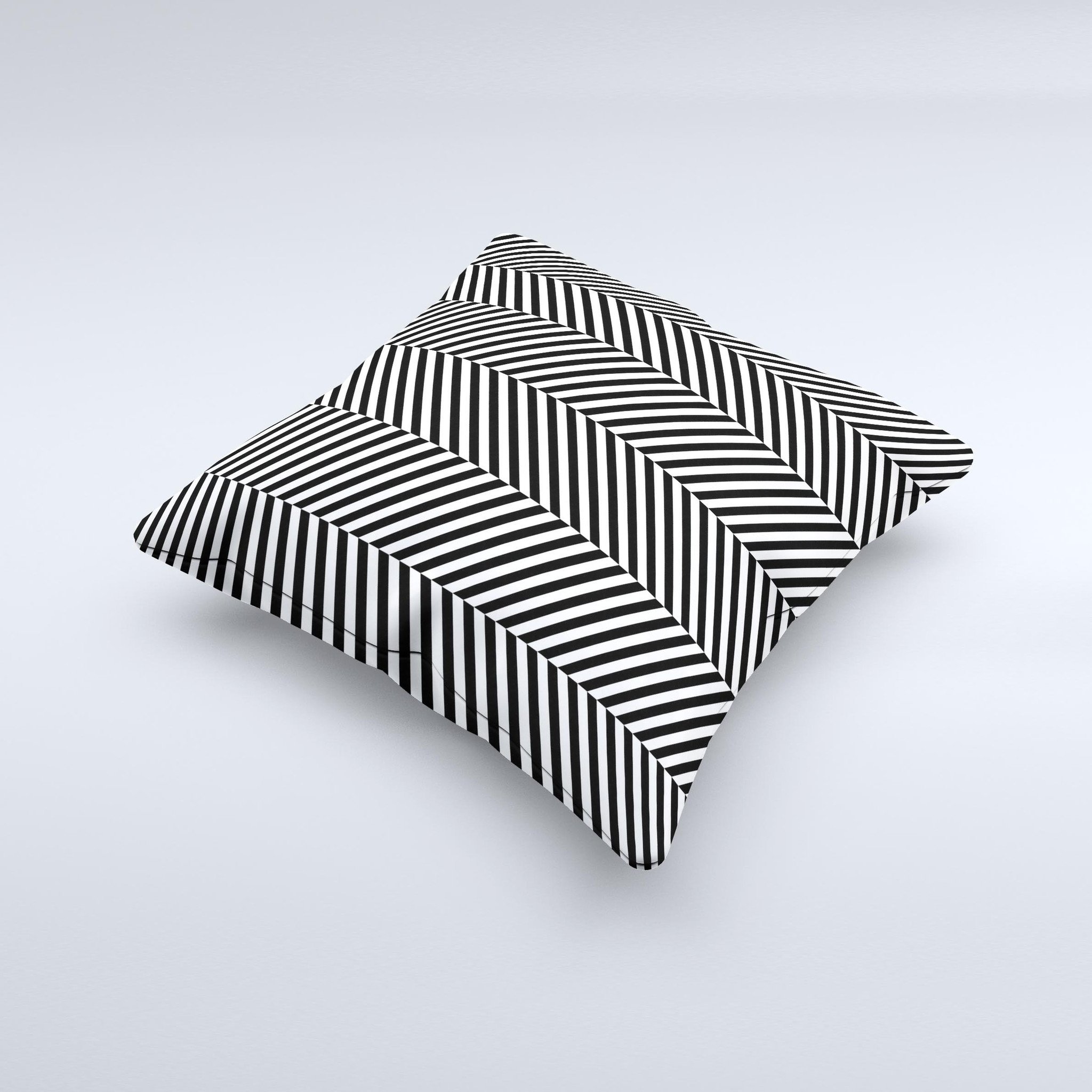 Black and white decorative throw pillow with opposite stripes, handcrafted in Virginia, showcasing unique artisanal design.