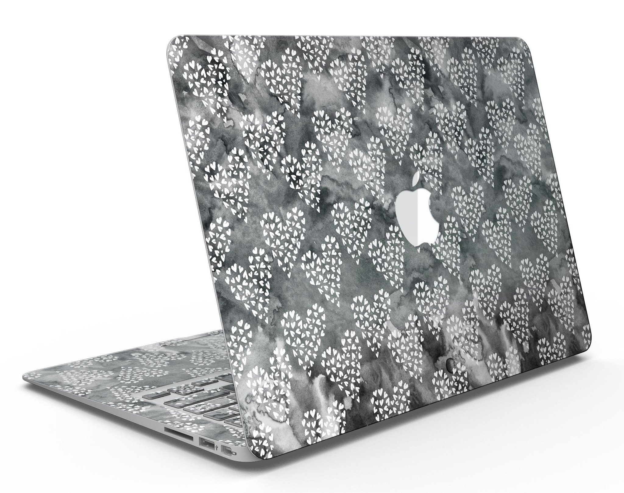 Black and white watercolor hearts design MacBook Air skin kit, showcasing a stylish and protective vinyl cover.