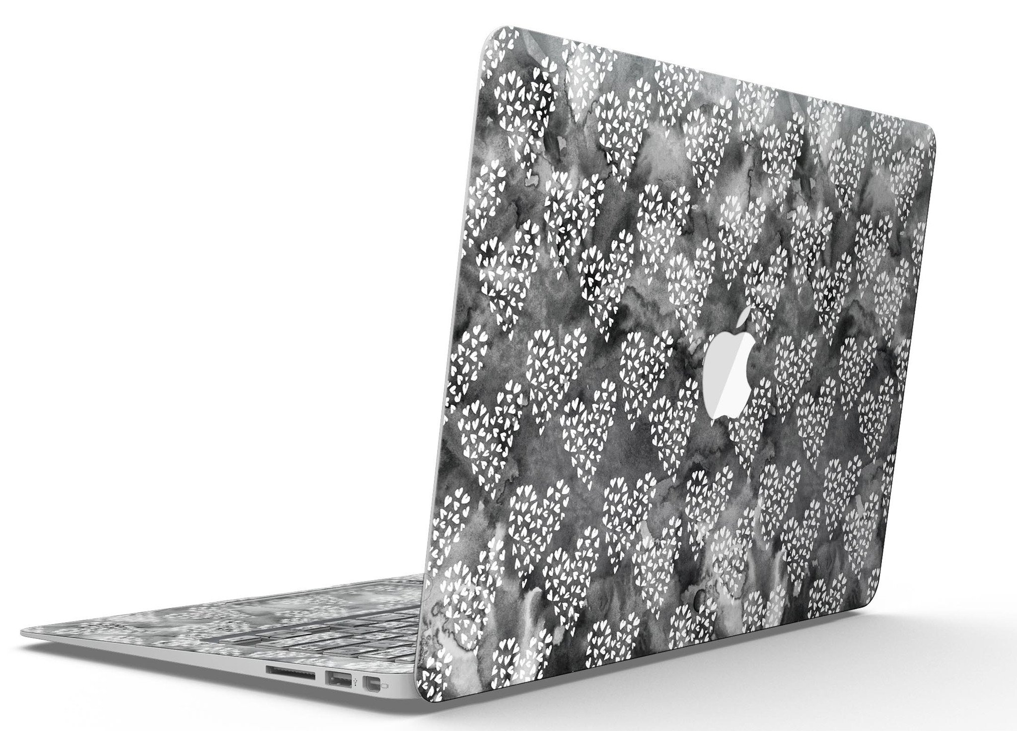 Black and white watercolor hearts design MacBook Air skin kit, showcasing a stylish and protective vinyl cover.