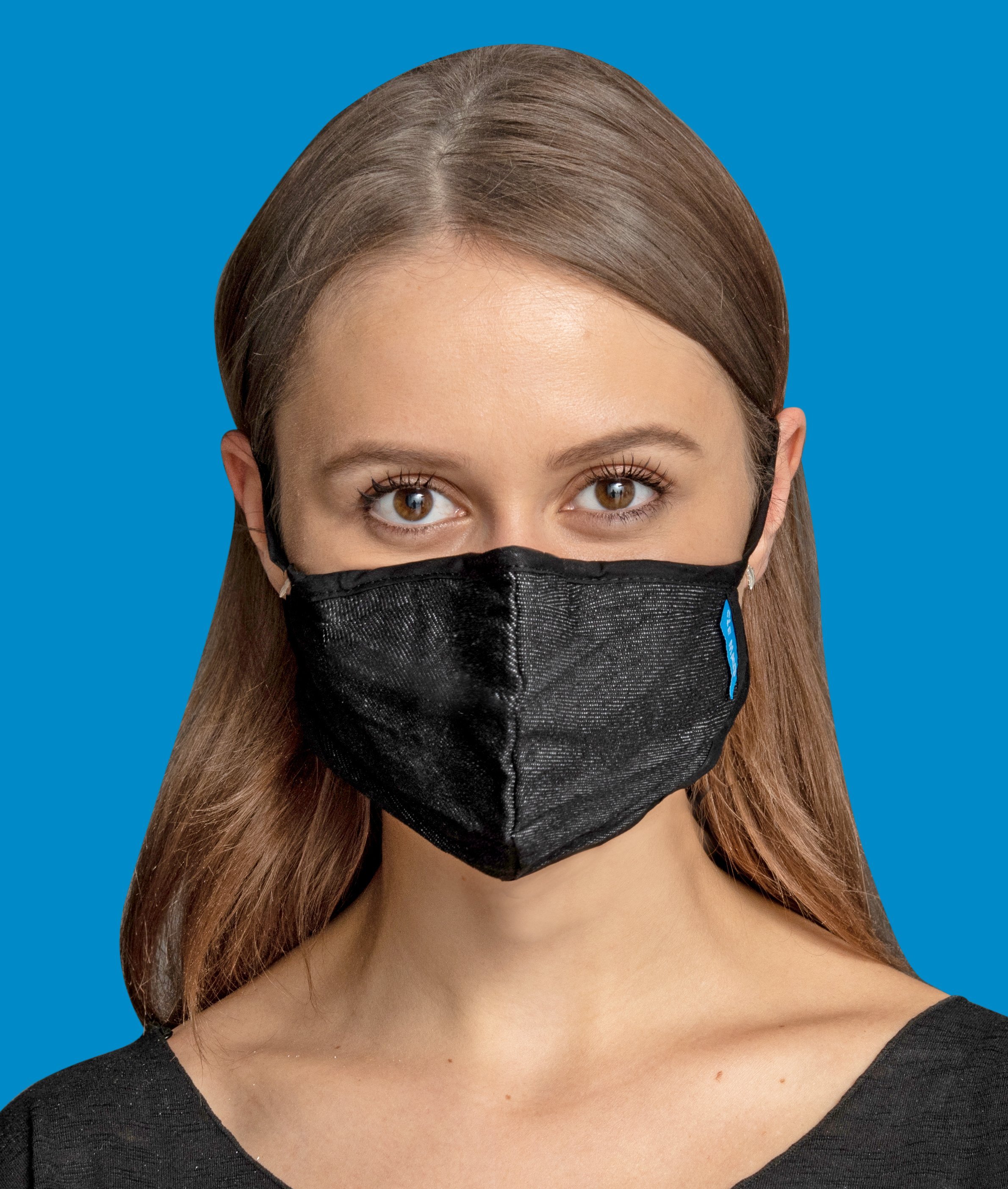 Black Canvas Mask featuring a breathable design with adjustable ear toggles and a removable inner layer for added comfort.