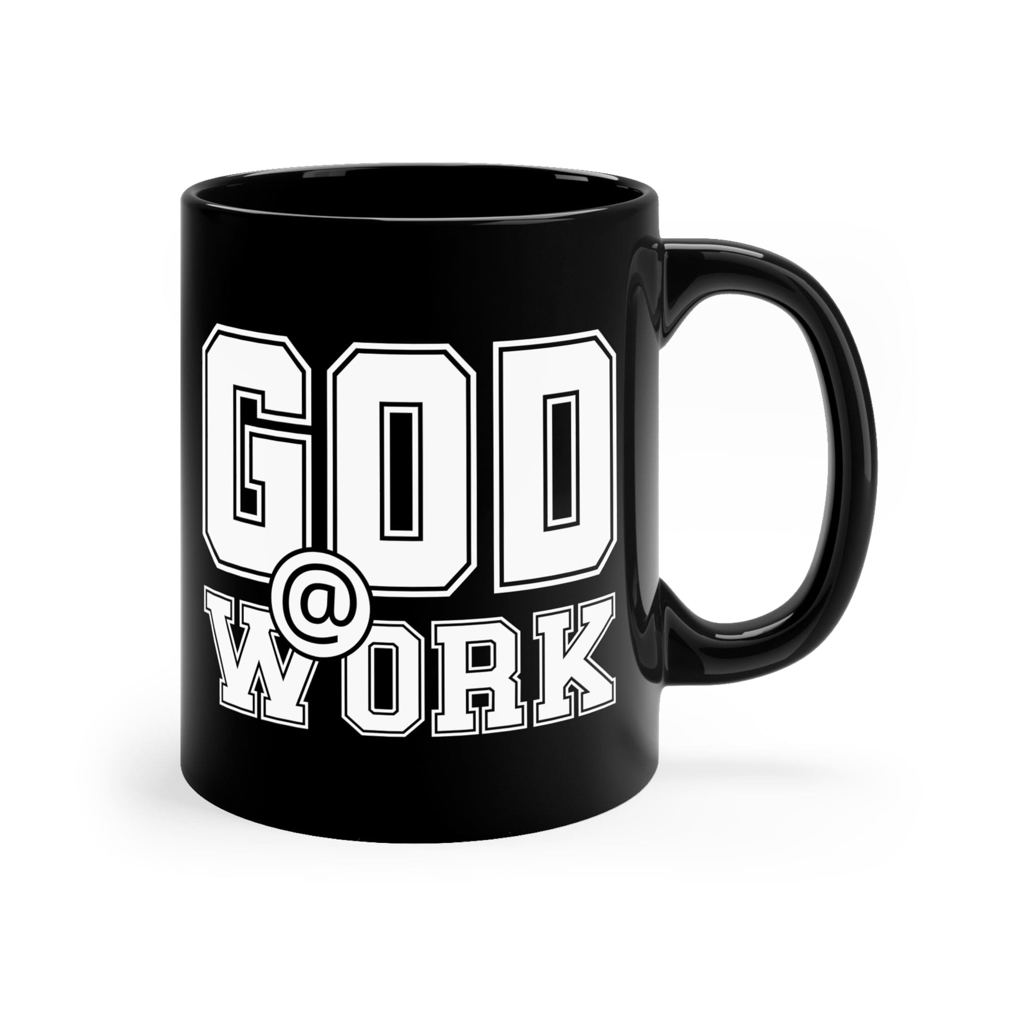 A stylish black ceramic mug with a glossy finish, featuring a white print that says 'God @ Work', perfect for coffee or tea.