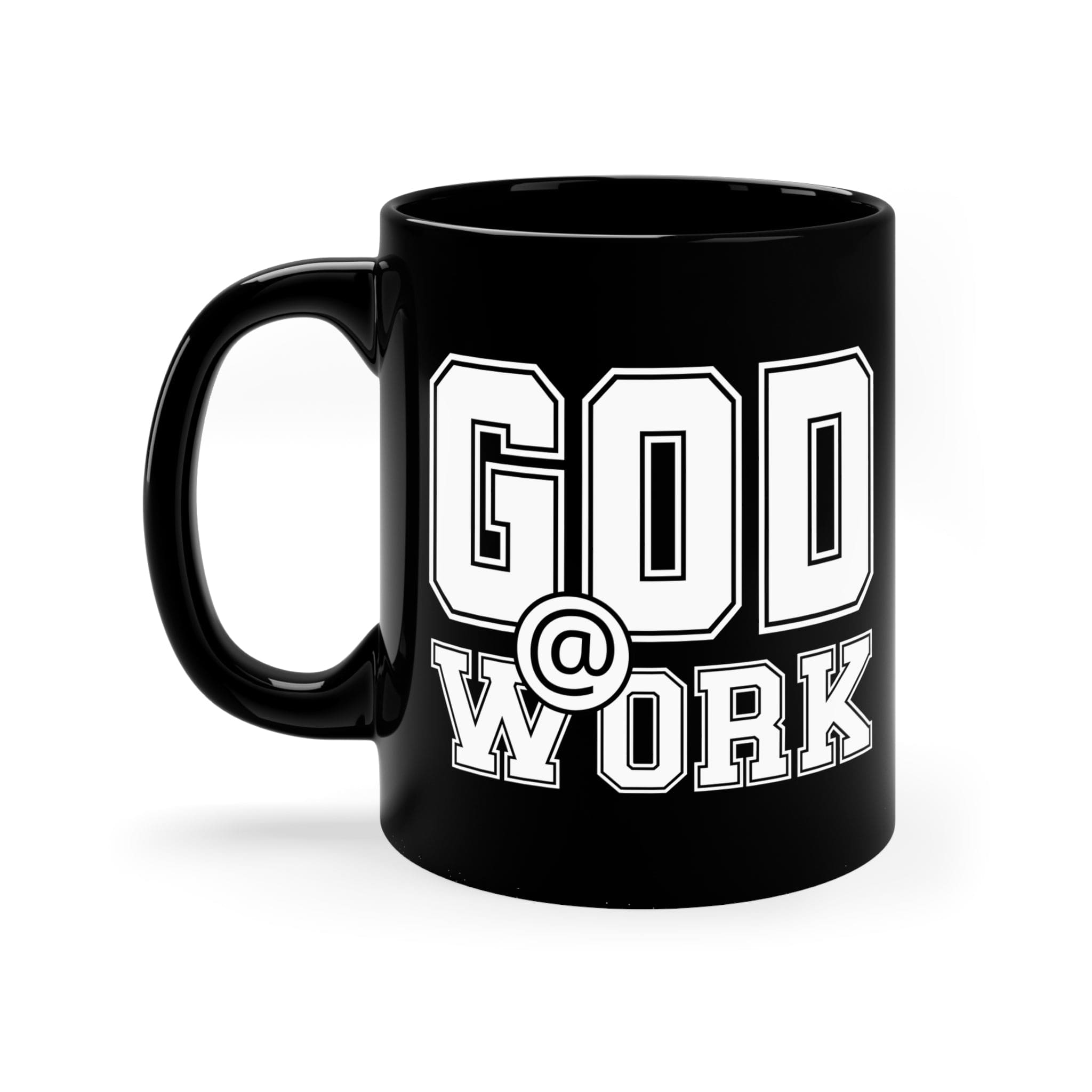 A stylish black ceramic mug with a glossy finish, featuring a white print that says 'God @ Work', perfect for coffee or tea.