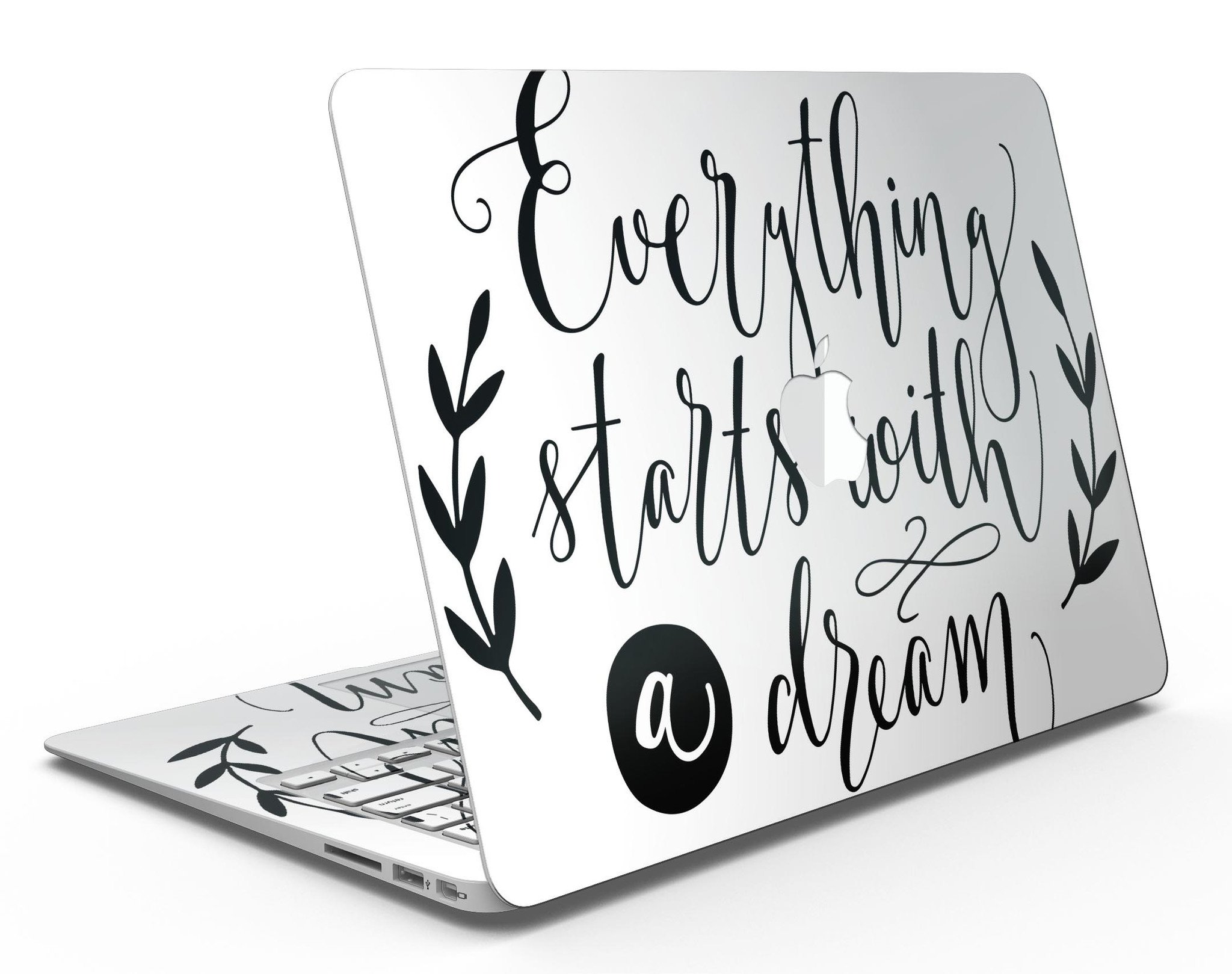 Black MacBook Air Skin Kit featuring a dream-inspired design, showcasing a sleek and stylish look while protecting the device.