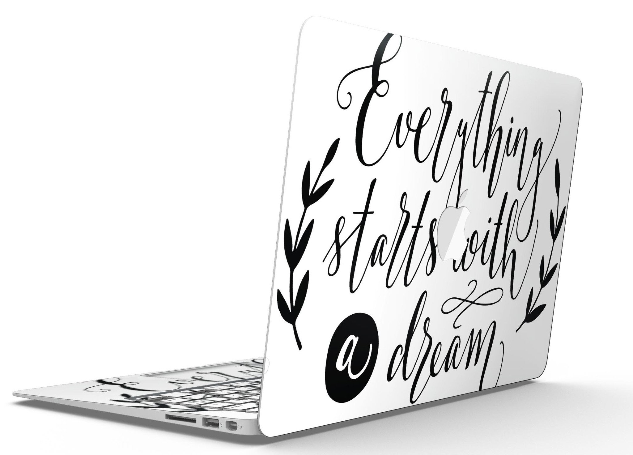 Black MacBook Air Skin Kit featuring a dream-inspired design, showcasing a sleek and stylish look while protecting the device.