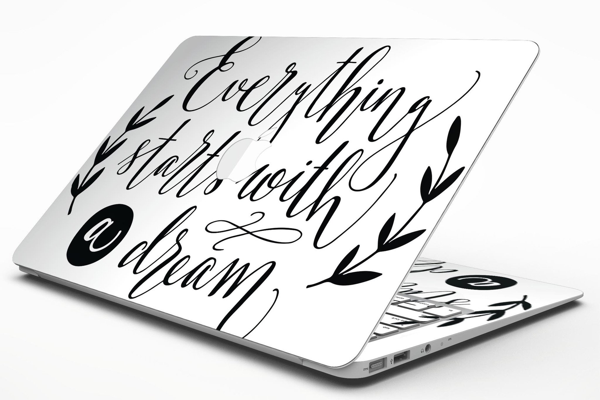 Black MacBook Air Skin Kit featuring a dream-inspired design, showcasing a sleek and stylish look while protecting the device.