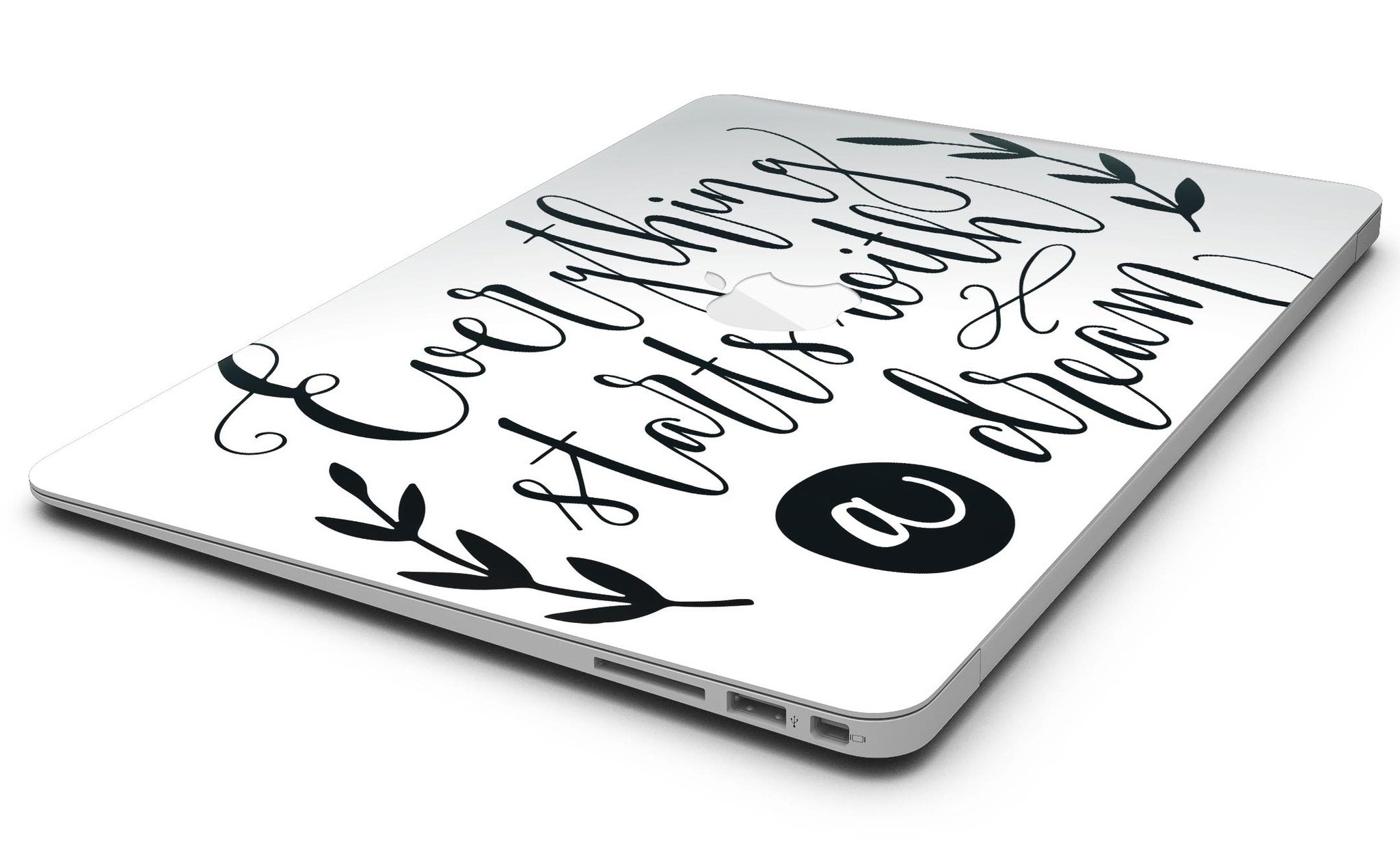 Black MacBook Air Skin Kit featuring a dream-inspired design, showcasing a sleek and stylish look while protecting the device.