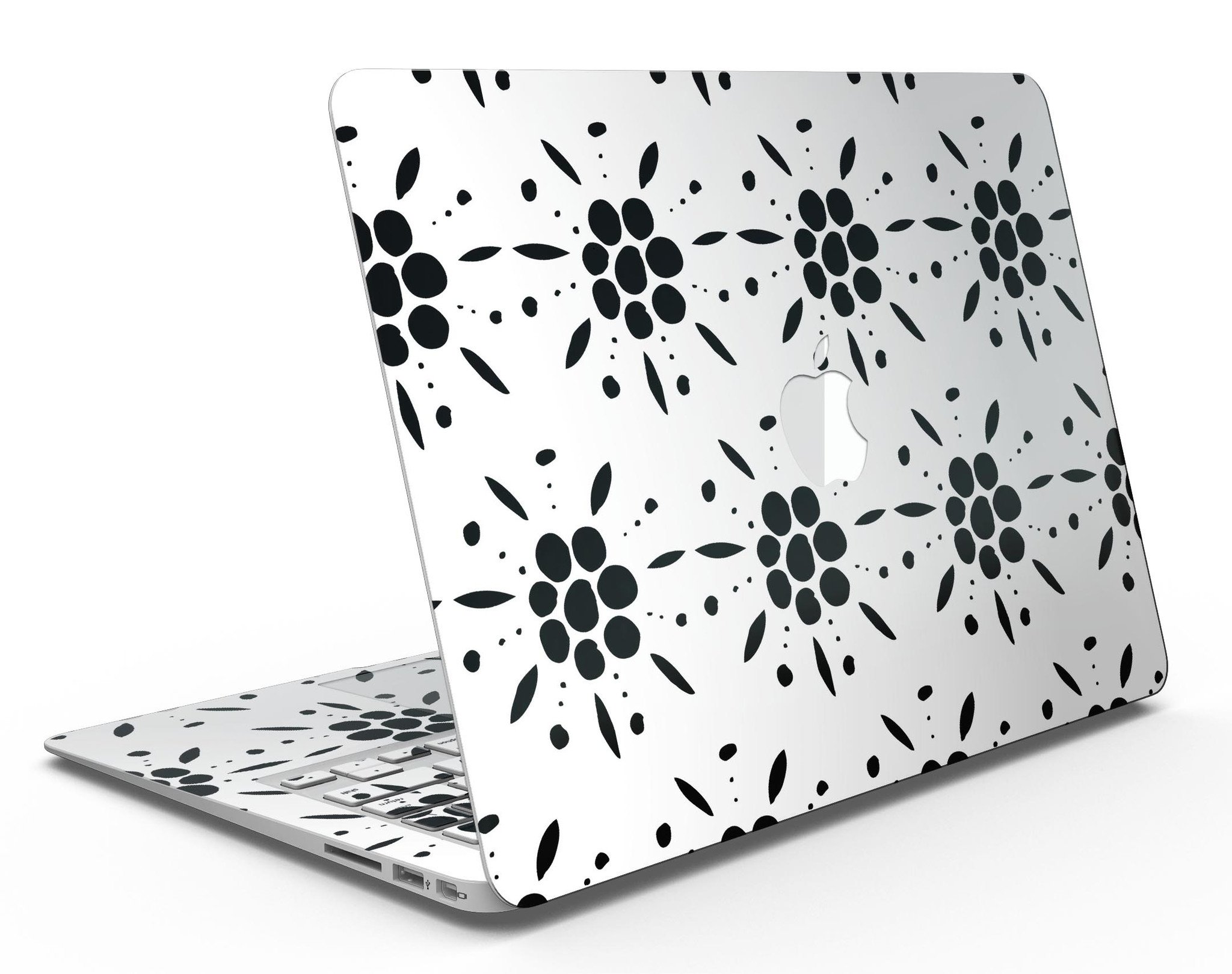 Black Floral Pedals MacBook Air skin kit showcasing a stylish design with clear cacking for protection.