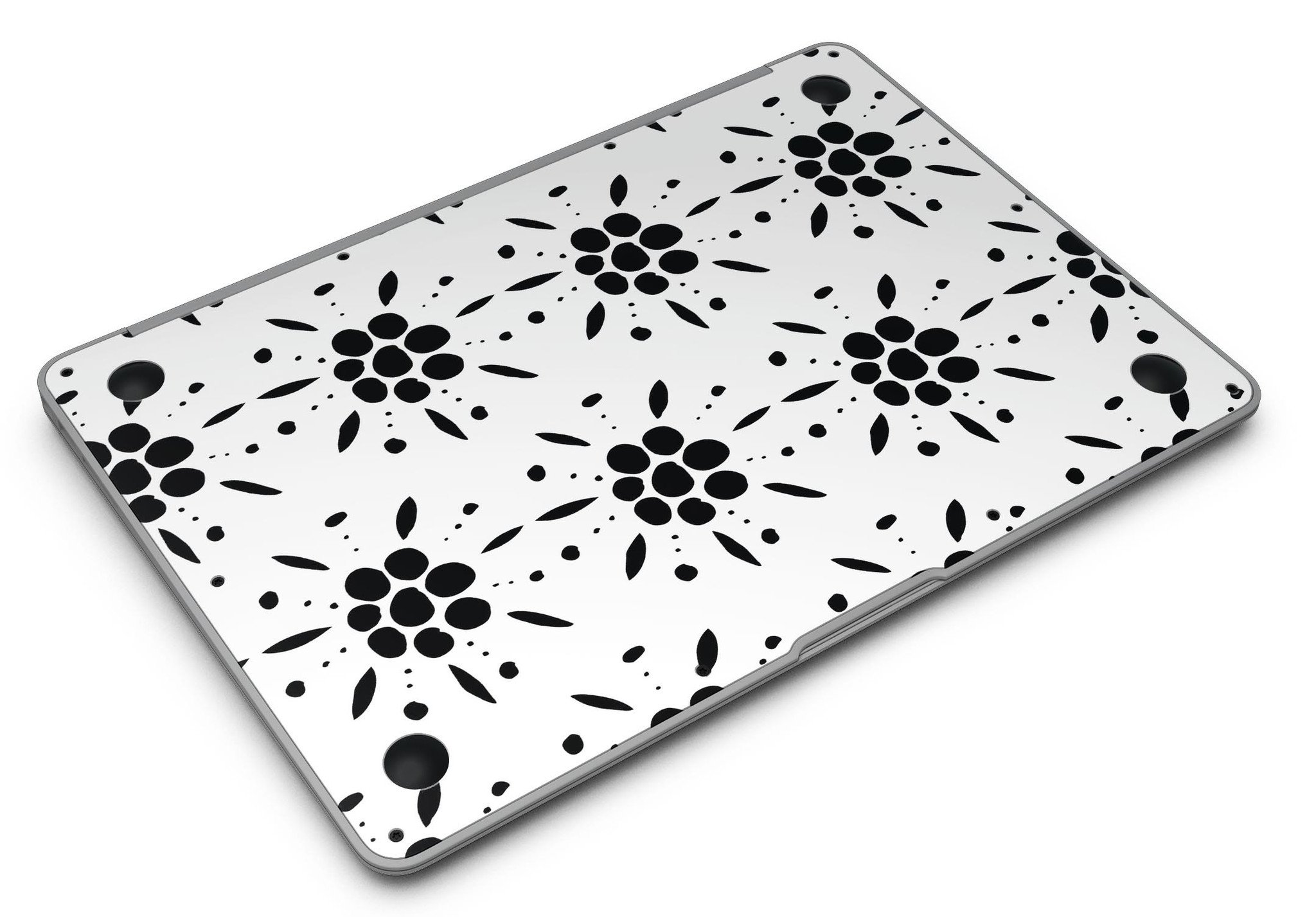 Black Floral Pedals MacBook Air skin kit showcasing a stylish design with clear cacking for protection.