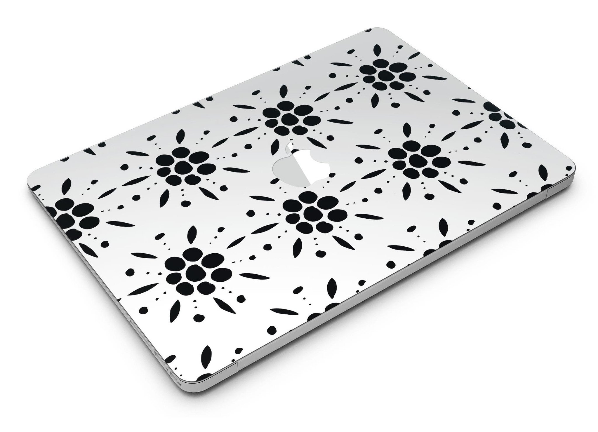 Black Floral Pedals MacBook Air skin kit showcasing a stylish design with clear cacking for protection.