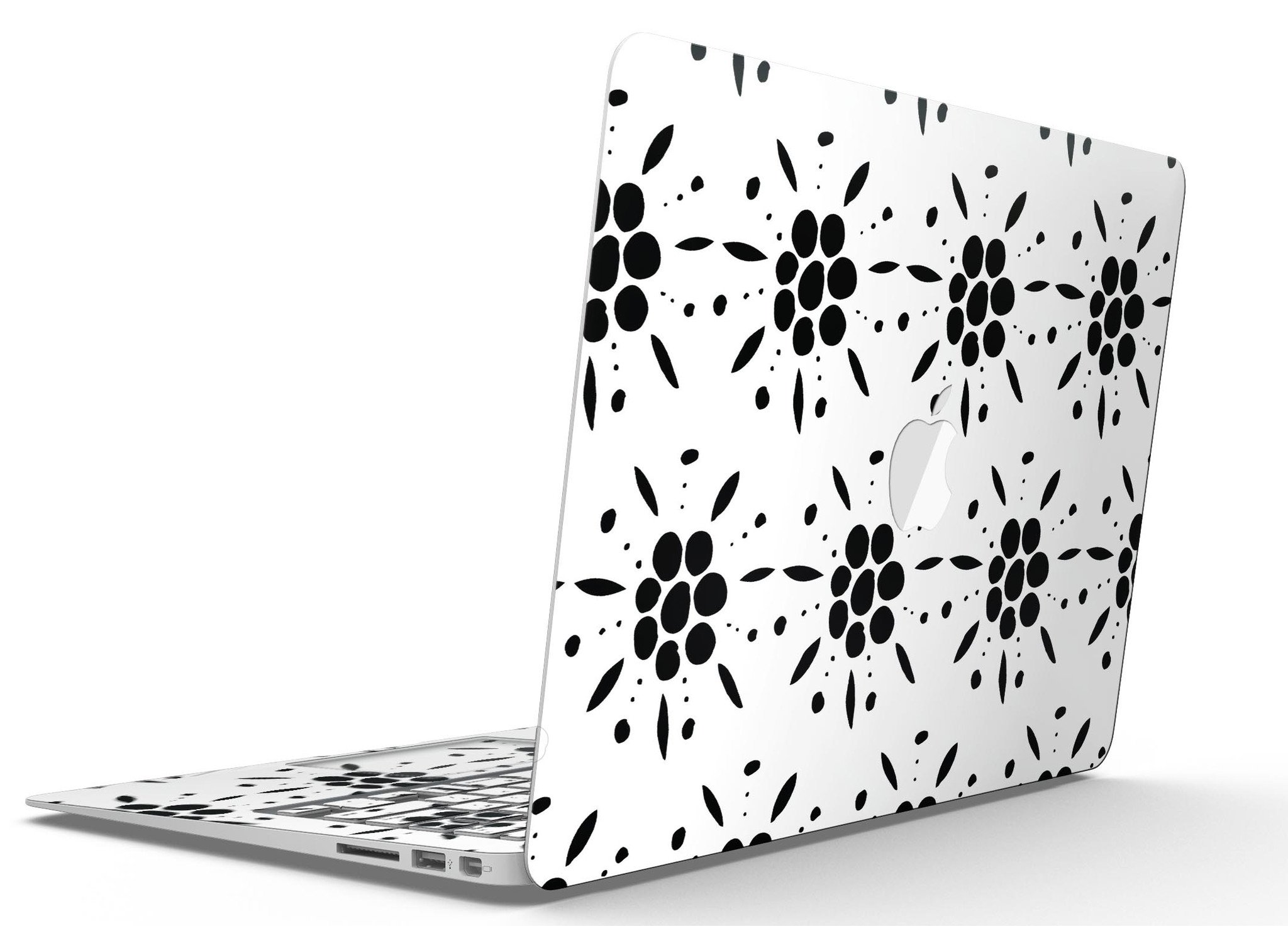 Black Floral Pedals MacBook Air skin kit showcasing a stylish design with clear cacking for protection.