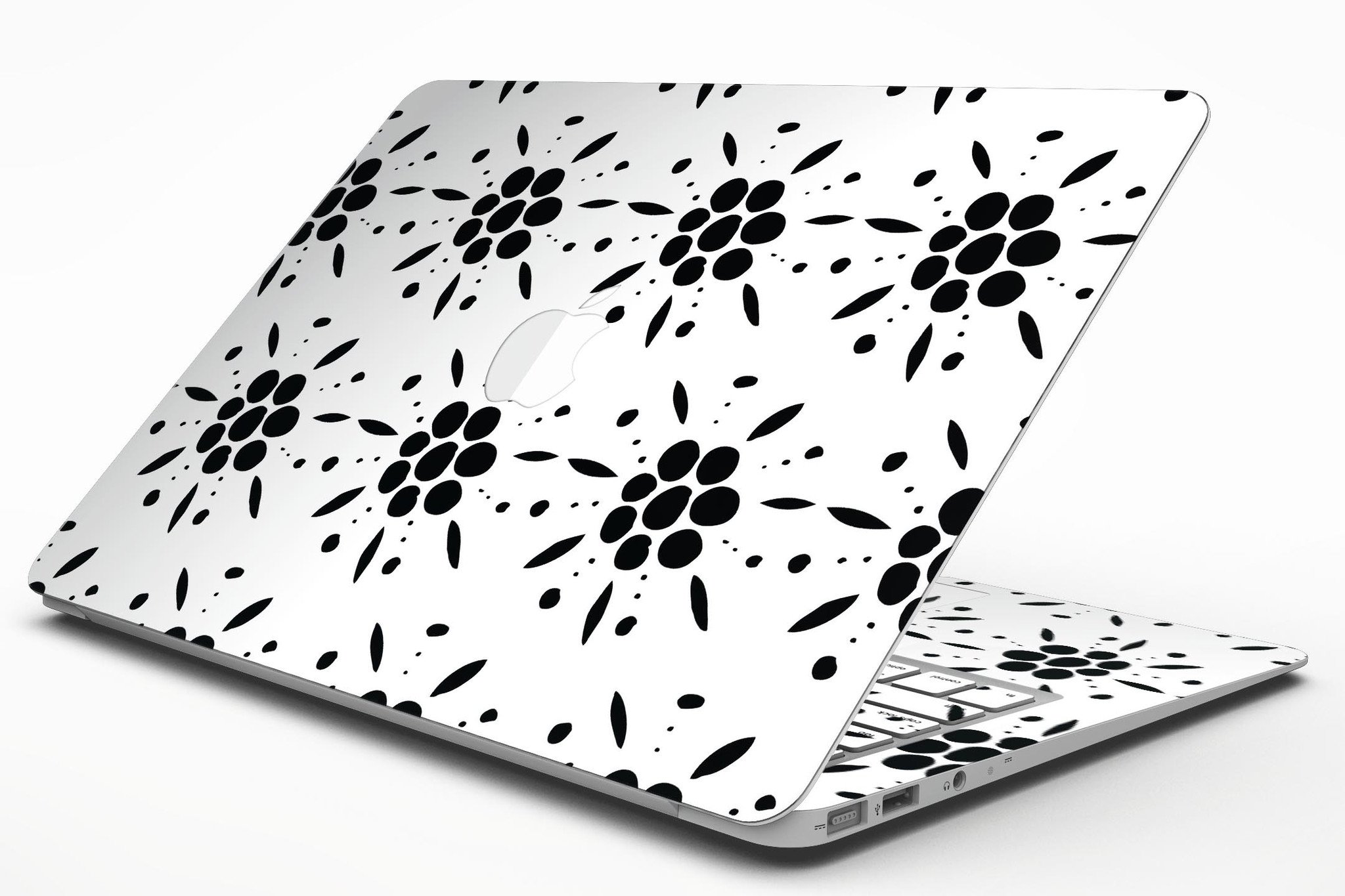 Black Floral Pedals MacBook Air skin kit showcasing a stylish design with clear cacking for protection.