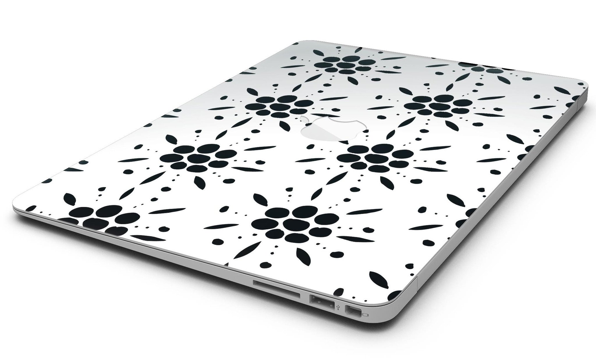 Black Floral Pedals MacBook Air skin kit showcasing a stylish design with clear cacking for protection.