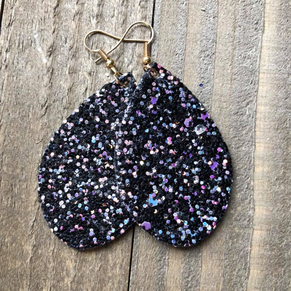 A pair of elegant Black Glitter Teardrop Earrings featuring a double-sided glitter design and nickel-free hooks, hanging approximately 3 inches.