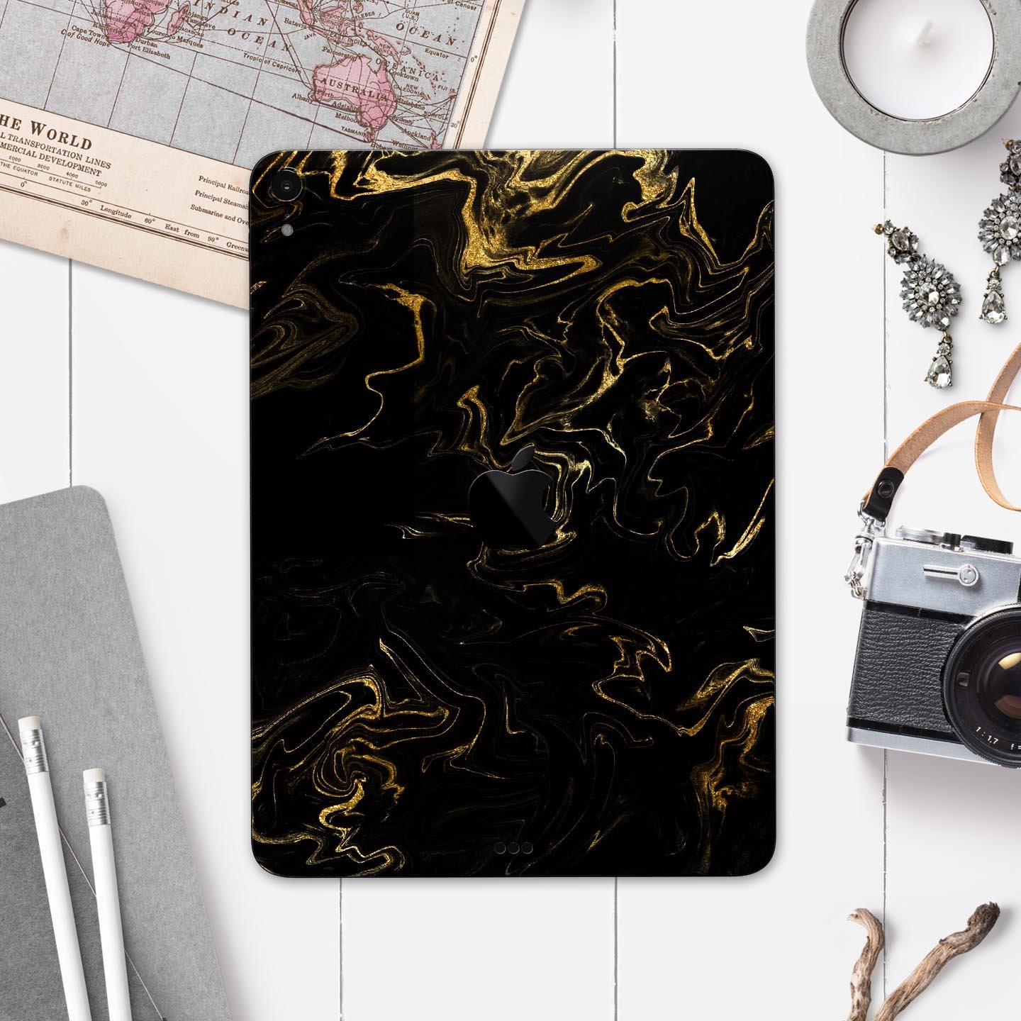 Black & Gold Marble Swirl V6 skin decal for Apple iPad, showcasing a luxurious marble design with a glossy finish.