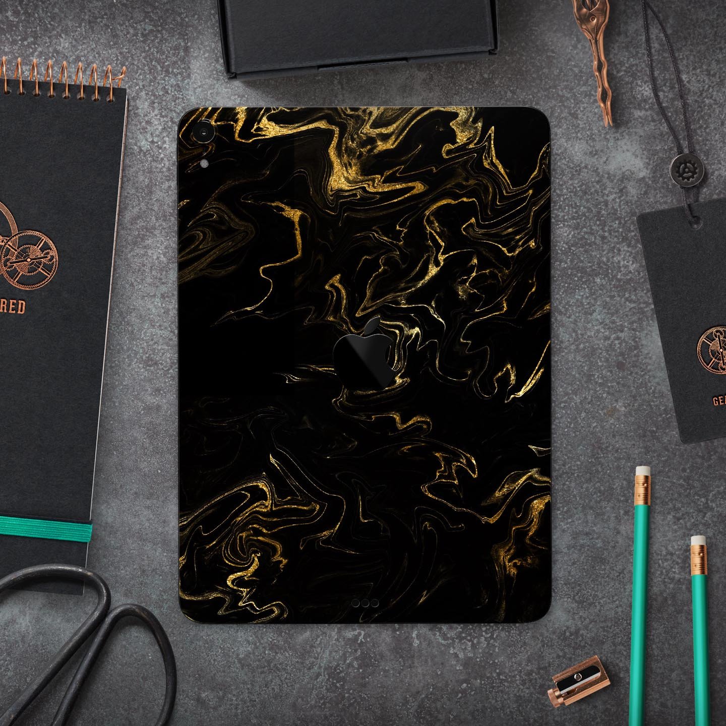 Black & Gold Marble Swirl V6 skin decal for Apple iPad, showcasing a luxurious marble design with a glossy finish.