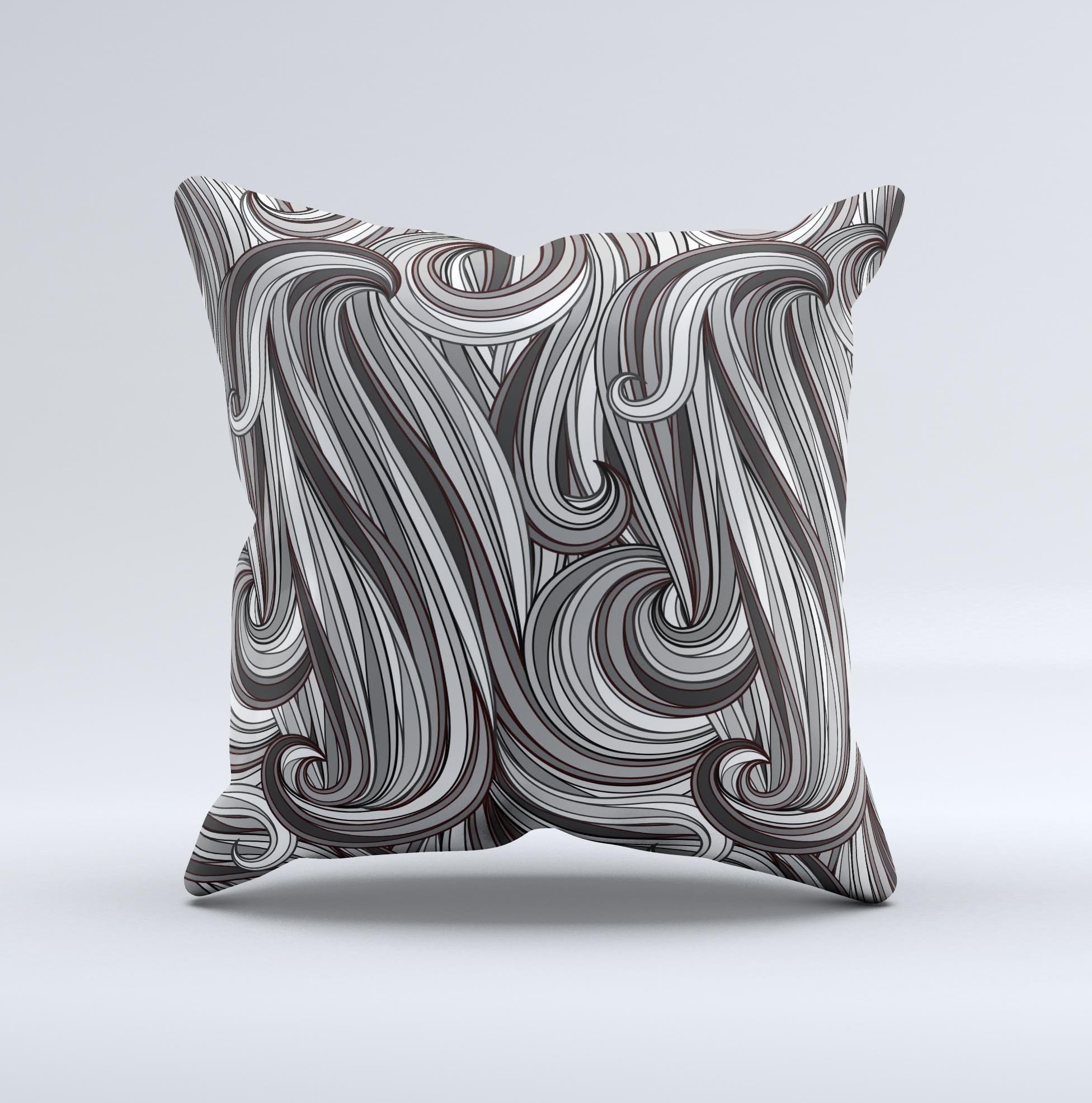 Black and gray decorative throw pillow with a unique monochrome pattern, handcrafted in Virginia, showcasing high-quality fabric and filling.