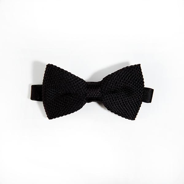 A stylish black knitted bow tie made from polyester, featuring a textured design suitable for formal and casual wear.