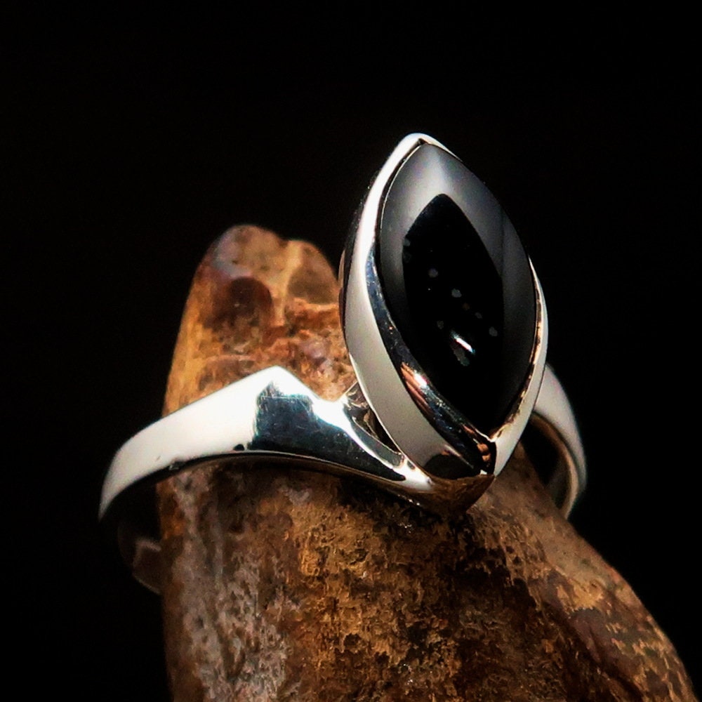 Elegant Black Onyx Ring in Sterling Silver with marquise-shaped stone, hallmarked 925.