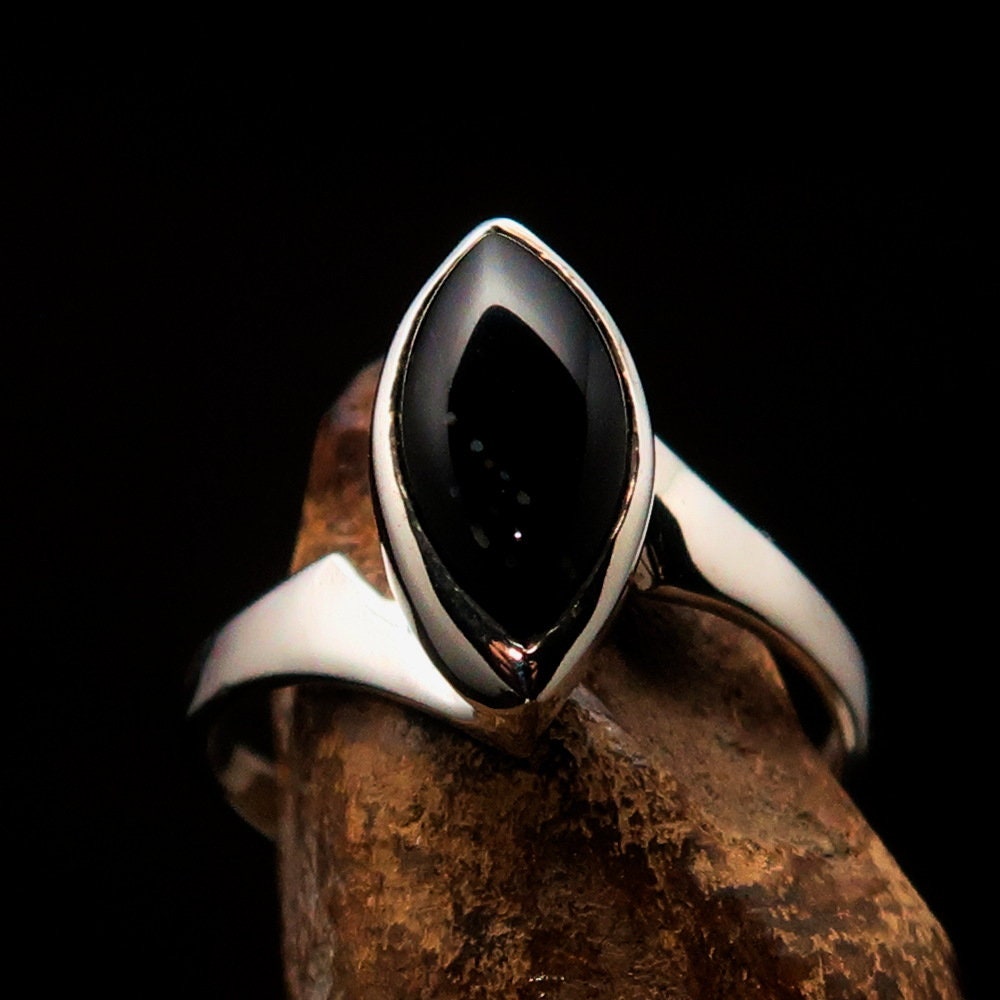 Elegant Black Onyx Ring in Sterling Silver with marquise-shaped stone, hallmarked 925.