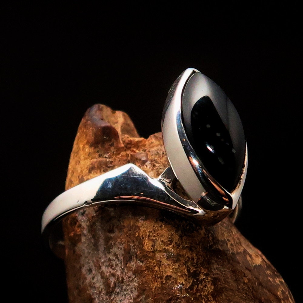 Elegant Black Onyx Ring in Sterling Silver with marquise-shaped stone, hallmarked 925.