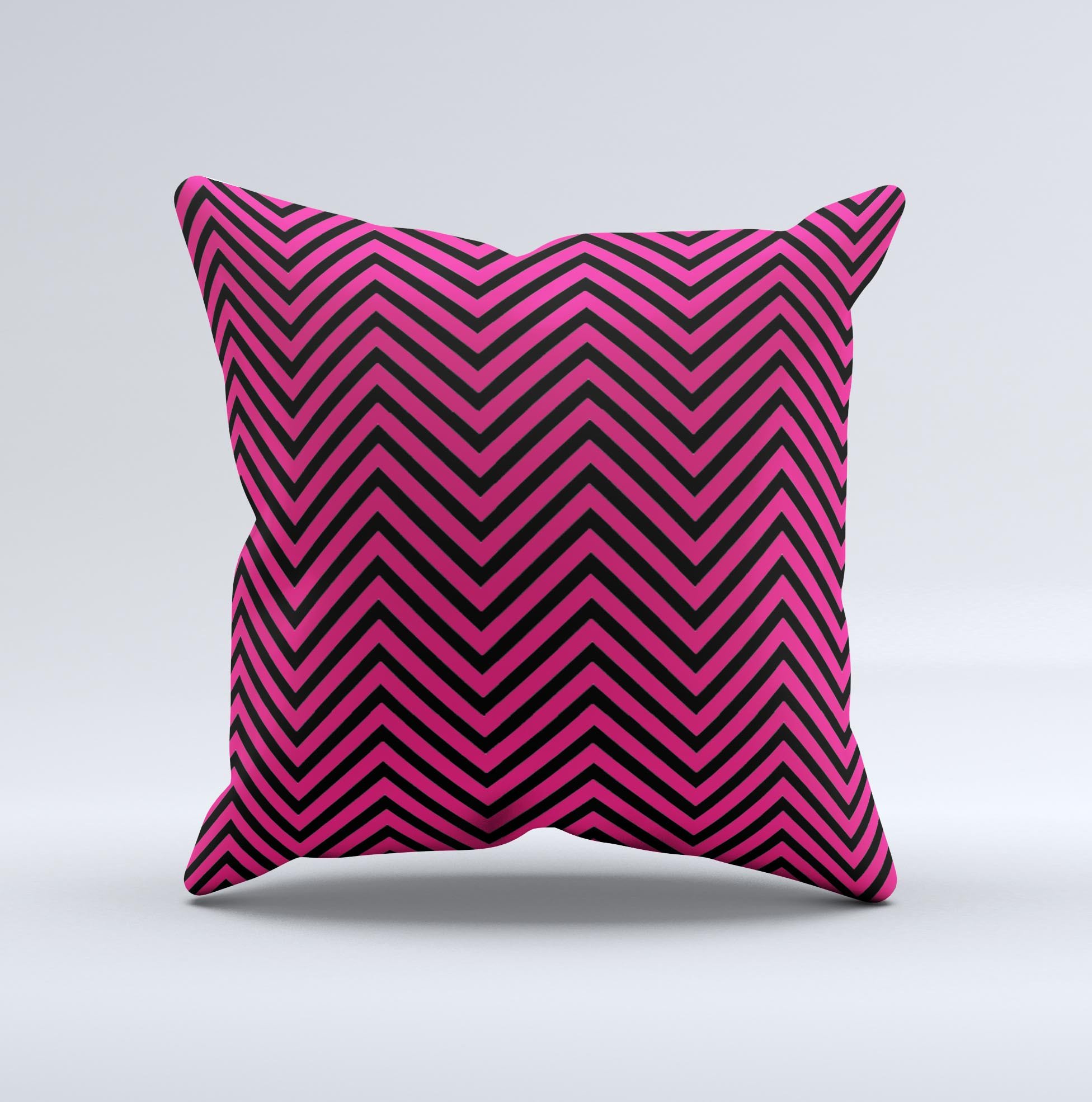 Black and pink decorative throw pillow featuring a sharp chevron pattern, handcrafted with high-quality materials.