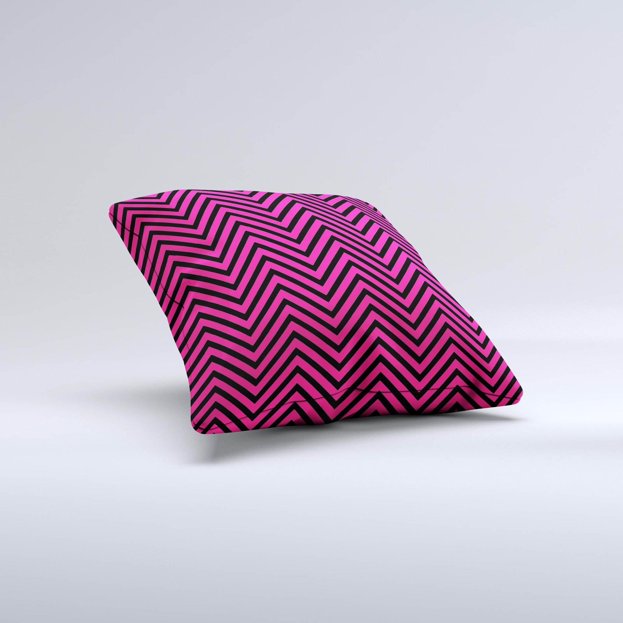 Black and pink decorative throw pillow featuring a sharp chevron pattern, handcrafted with high-quality materials.