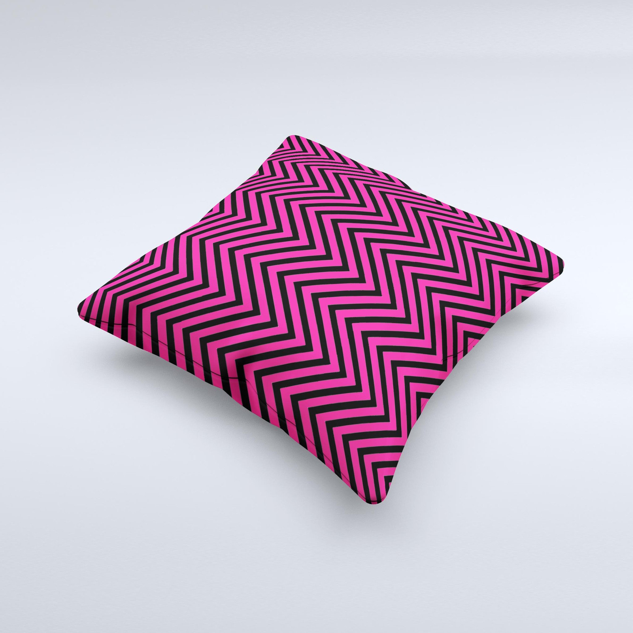 Black and pink decorative throw pillow featuring a sharp chevron pattern, handcrafted with high-quality materials.