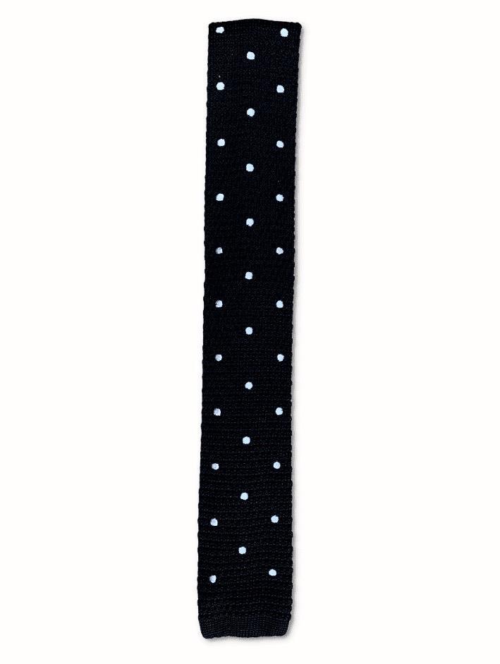 Black knitted tie featuring white polka dots, elegantly designed for formal and casual wear.