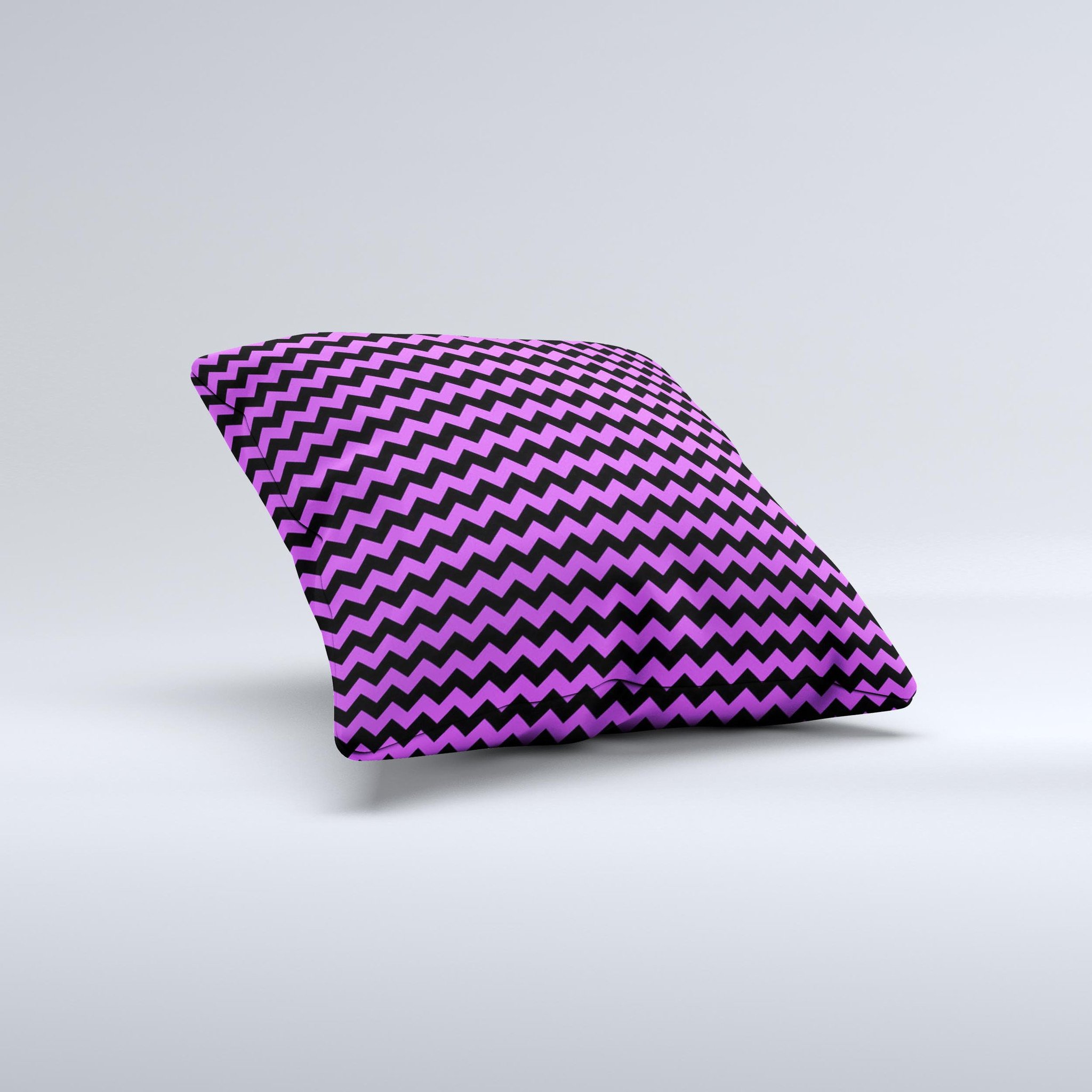 Black and purple decorative throw pillow featuring a chevron pattern, handcrafted in Virginia with high-quality materials.