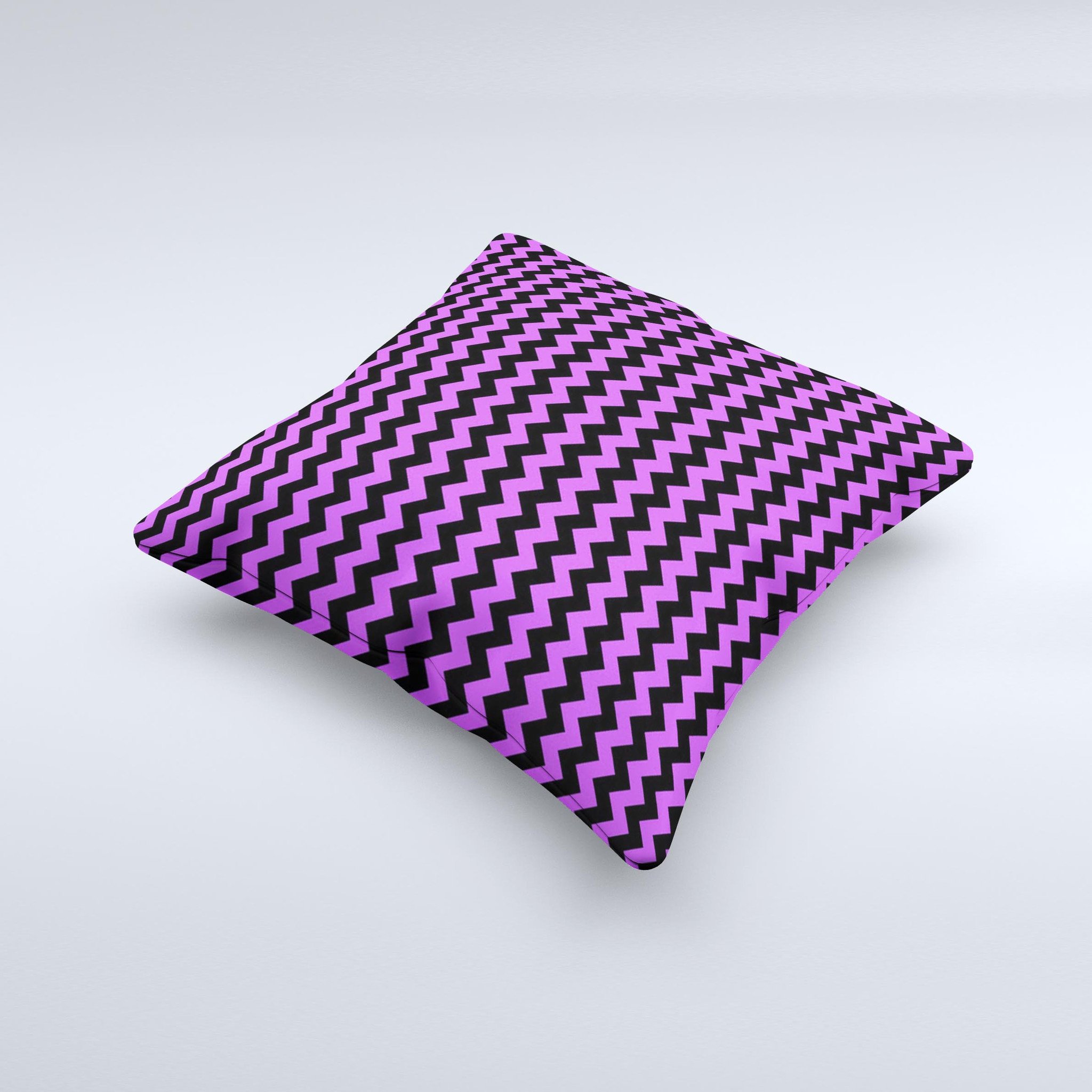 Black and purple decorative throw pillow featuring a chevron pattern, handcrafted in Virginia with high-quality materials.