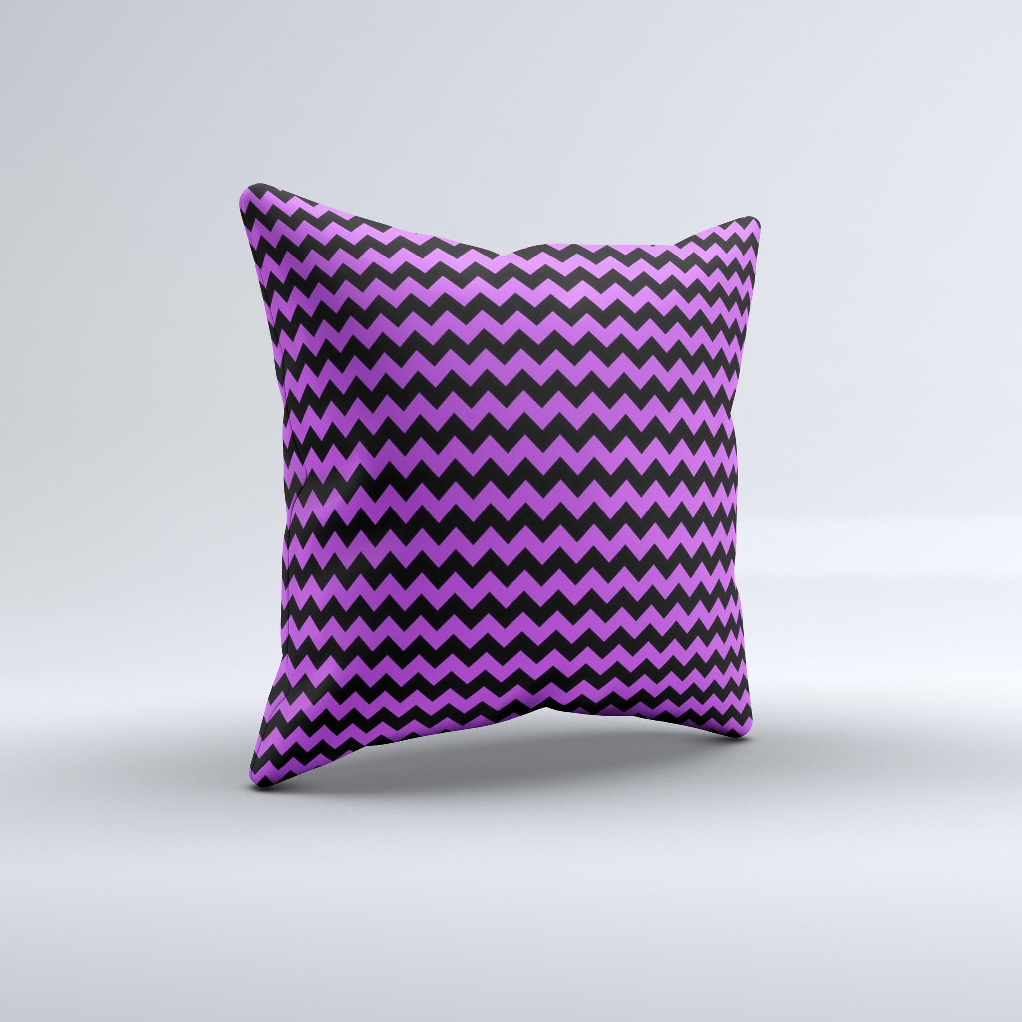 Black and purple decorative throw pillow featuring a chevron pattern, handcrafted in Virginia with high-quality materials.