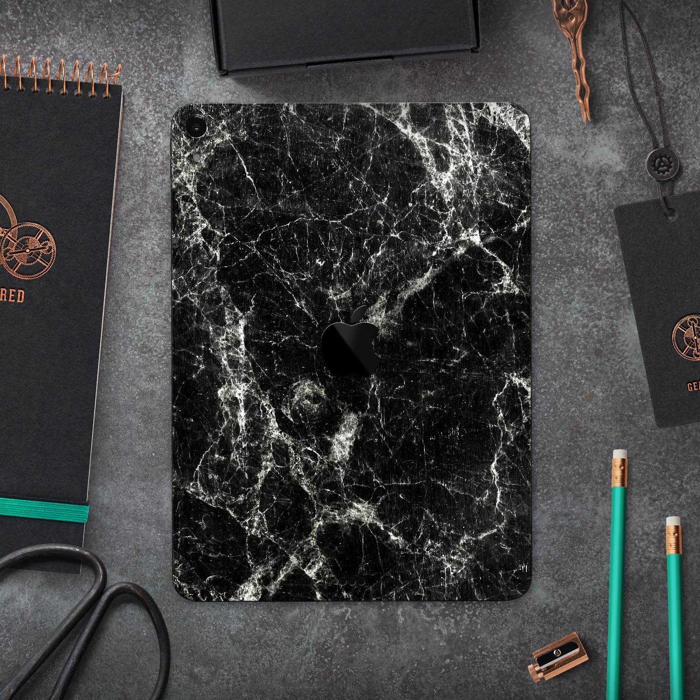 Black Scratched Marble Full Body Skin Decal for Apple iPad Pro, showcasing a stylish marble design with ultra-thin protection.