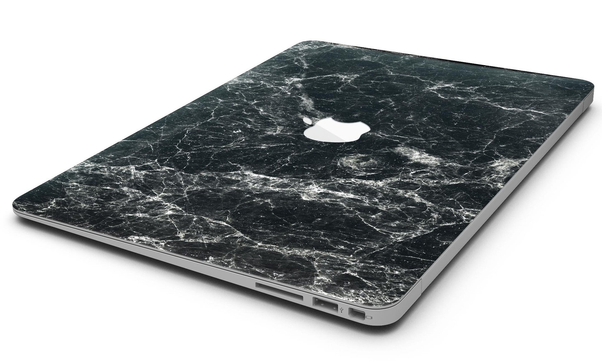 Black Scratched Marble skin applied to a MacBook Air, showcasing its stylish design and sleek finish.